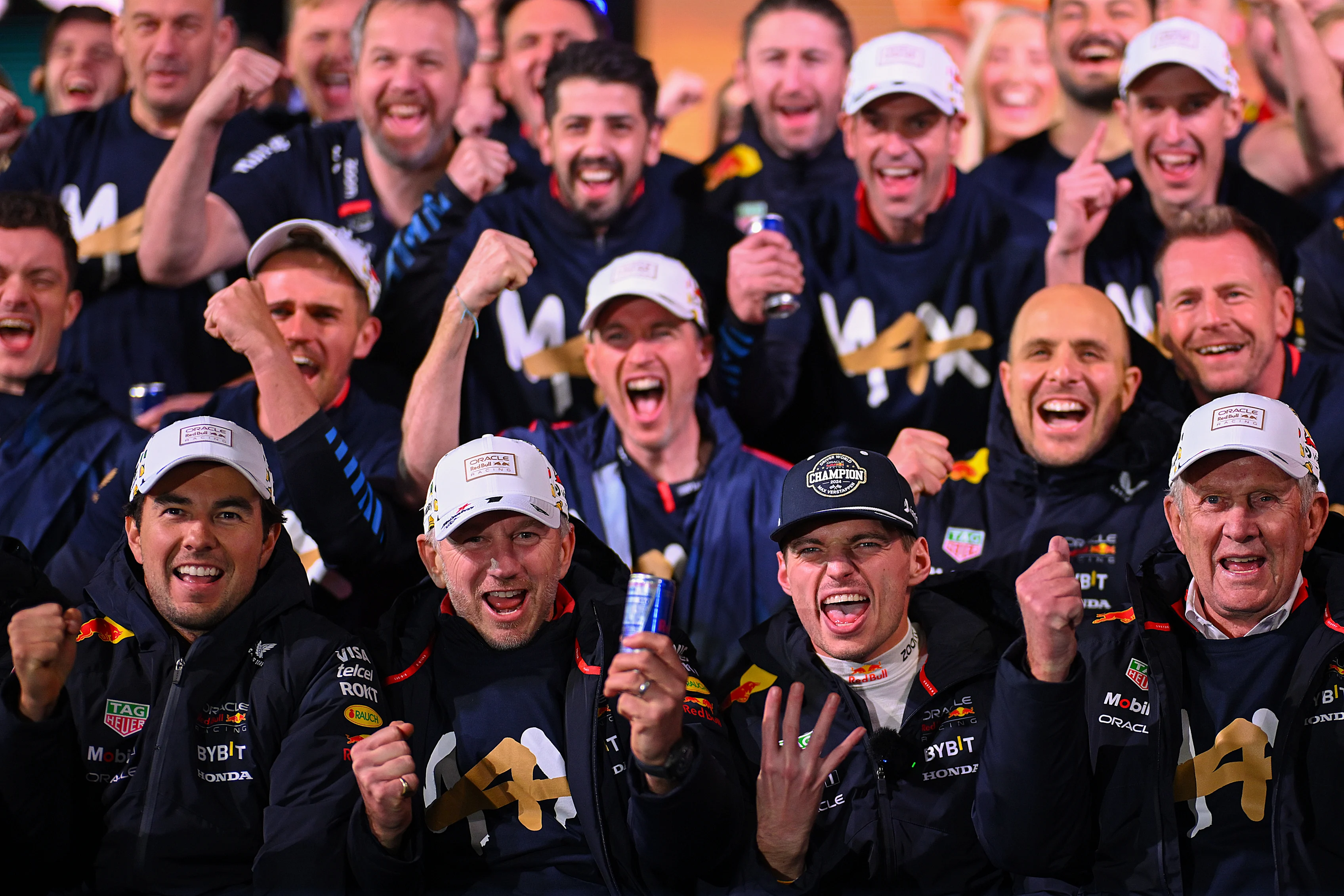 2024 F1 World Drivers Champion Max Verstappen celebrates alongside Sergio Perez, Oracle Red Bull Racing Team Principal Christian Horner and Dr Helmut Marko after the F1 Grand Prix of Las Vegas on November 23, 2024. (Photo by Clive Mason/Getty Images)