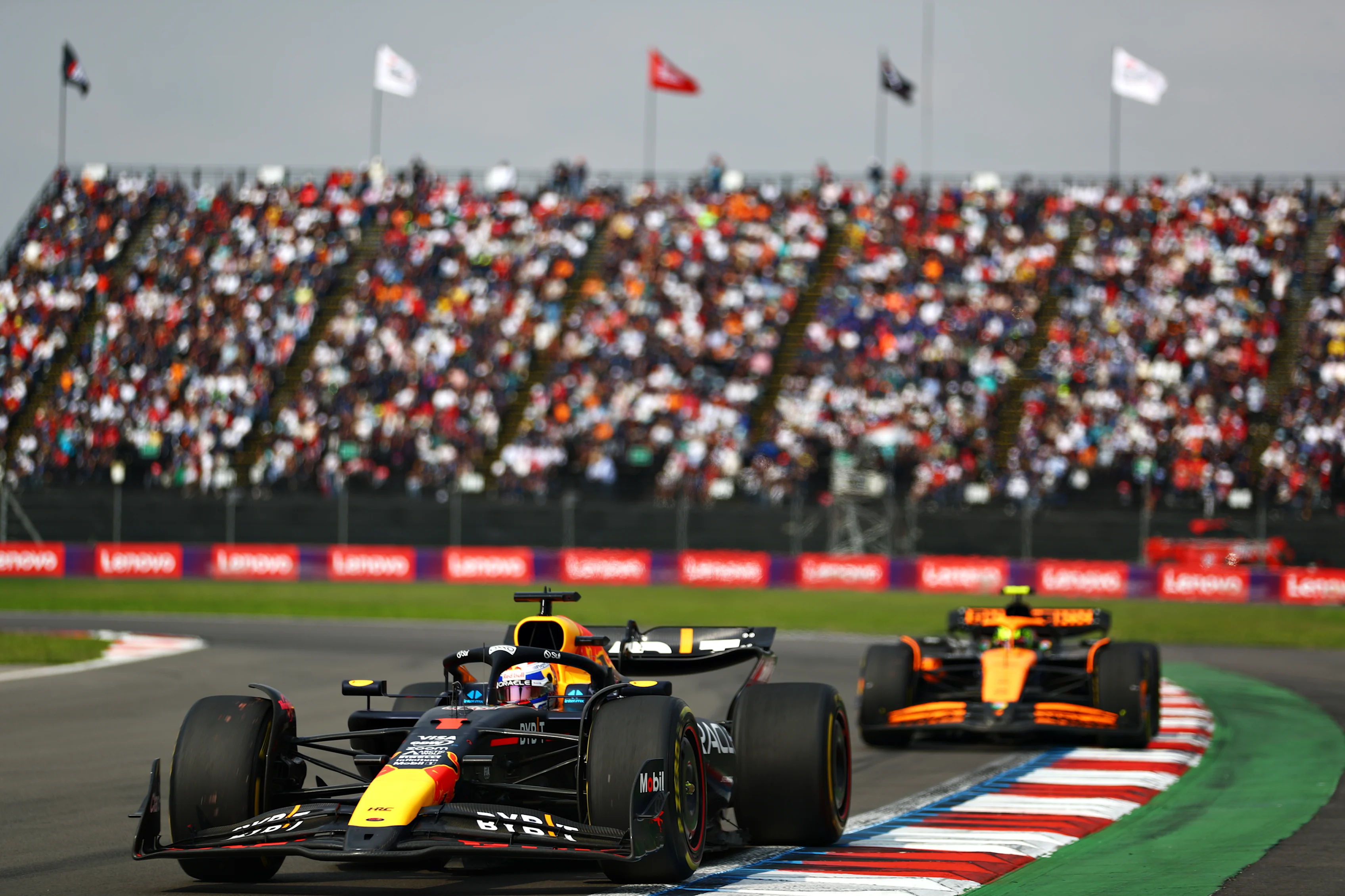 Max Verstappen driving the (1) Oracle Red Bull Racing RB20 leads Lando Norris driving the (4) McLaren MCL38 Mercedes on track during the F1 Grand Prix of Mexico on October 27, 2024. (Photo by Peter Fox - Formula 1/Formula 1 via Getty Images)