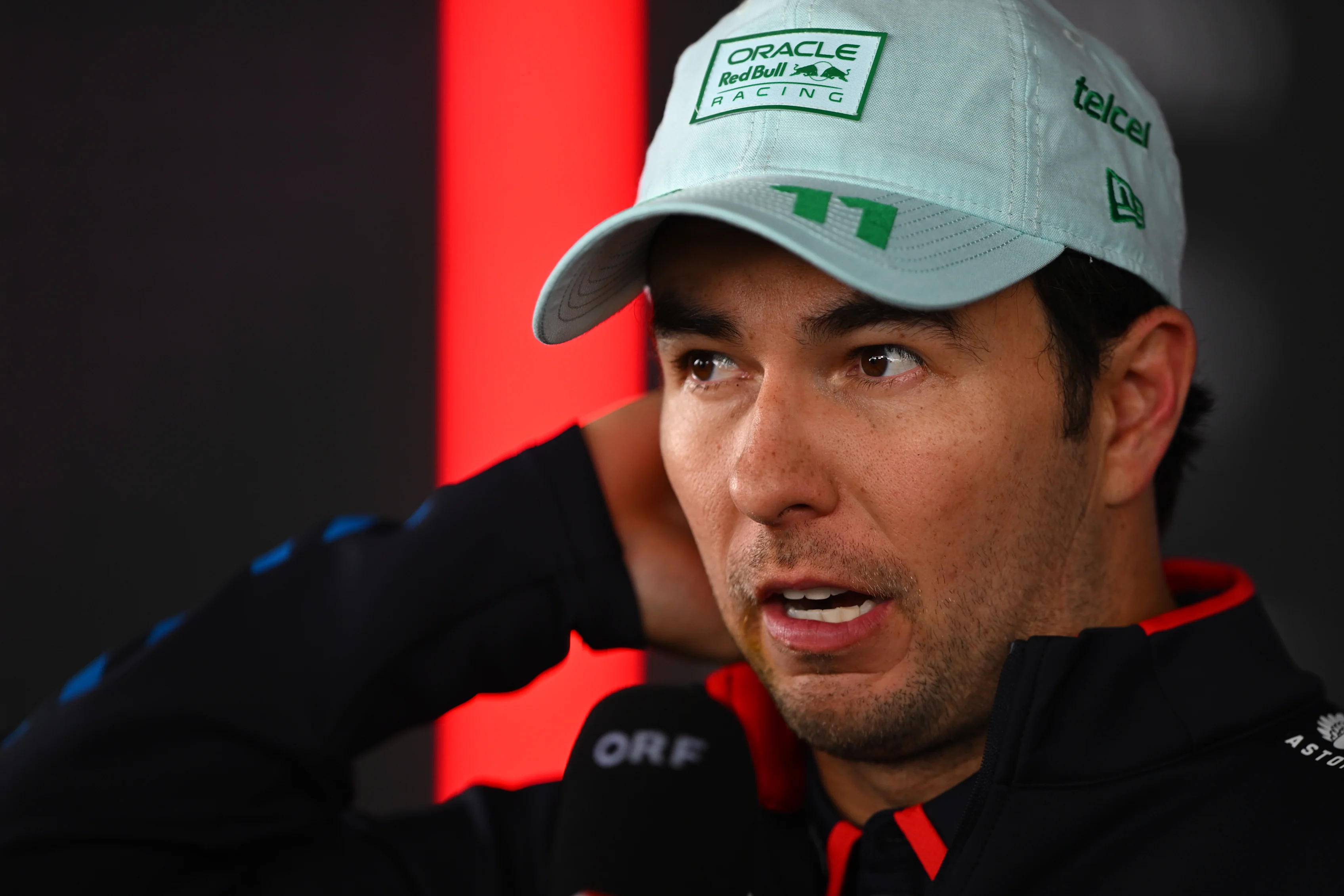 MEXICO CITY, MEXICO - OCTOBER 27: Sergio Perez of Mexico and Oracle Red Bull Racing talks to the