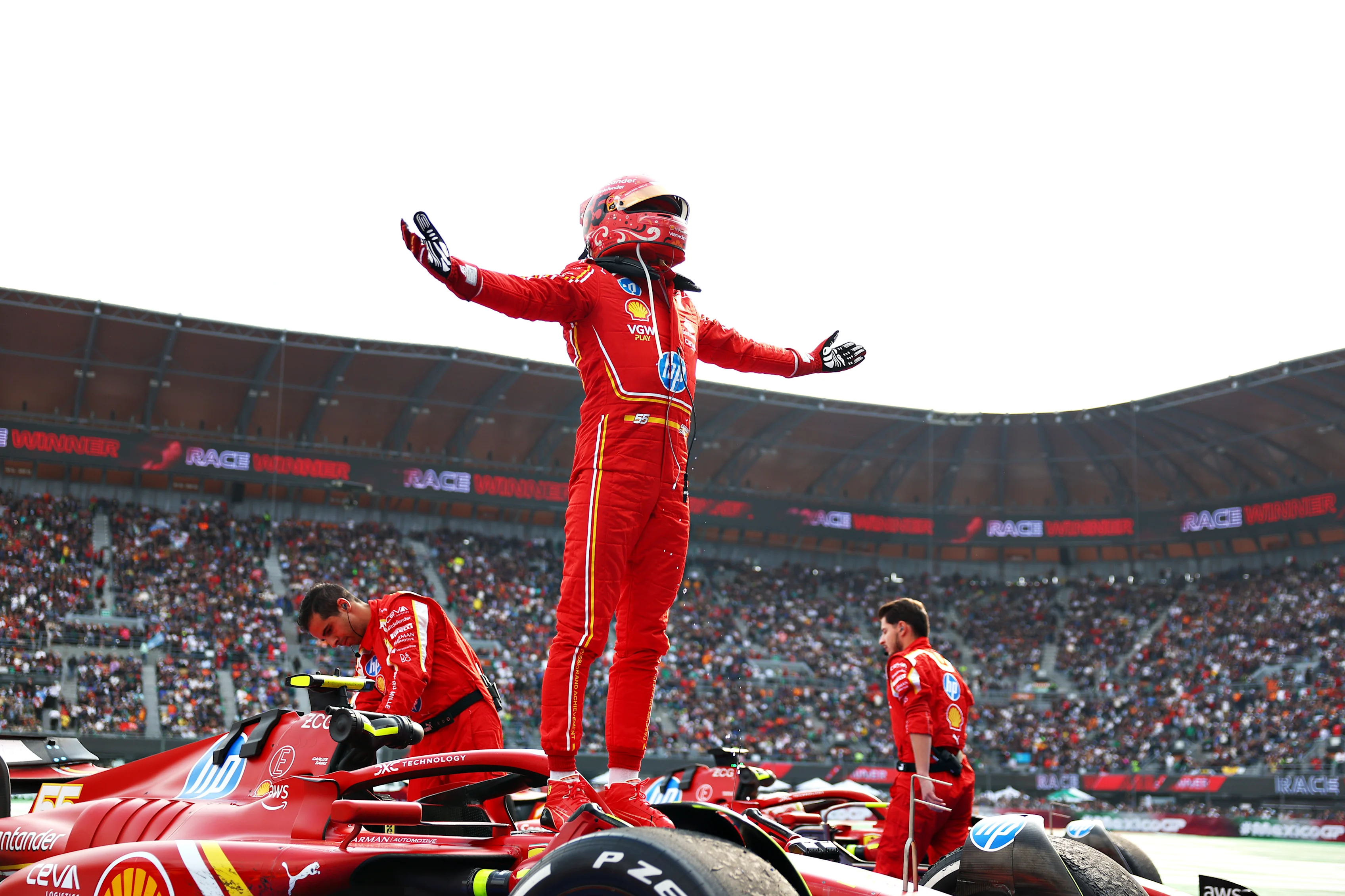 MEXICO CITY, MEXICO - OCTOBER 27: Race winner Carlos Sainz of Spain and Ferrari celebrates in parc