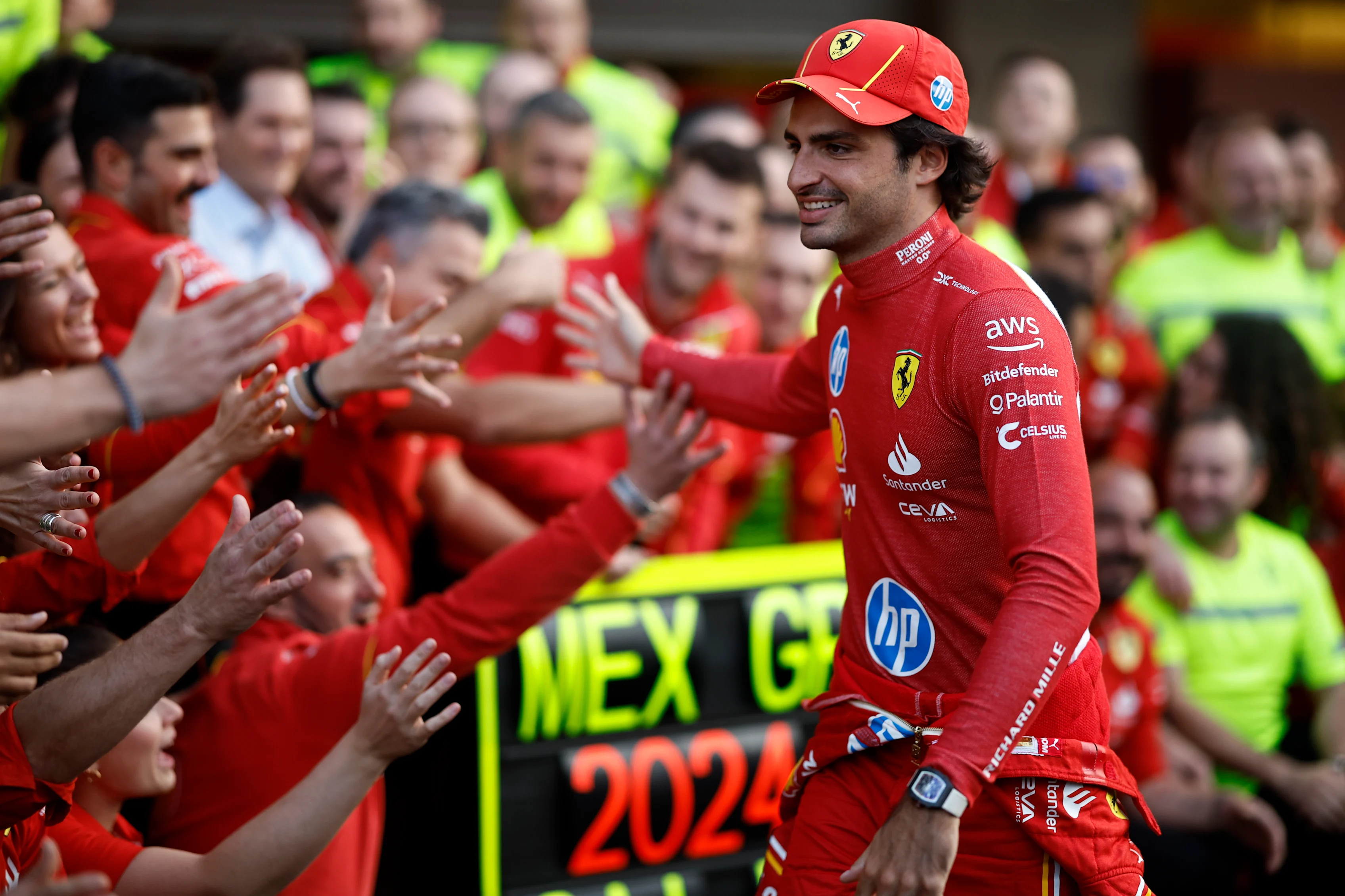 MEXICO CITY, MEXICO - OCTOBER 27: Race winner Carlos Sainz of Spain and Ferrari celebrates with his team after the F1 Grand Prix of Mexico at Autodromo Hermanos Rodriguez on October 27, 2024 in Mexico City, Mexico. (Photo by Chris Graythen/Getty Images)