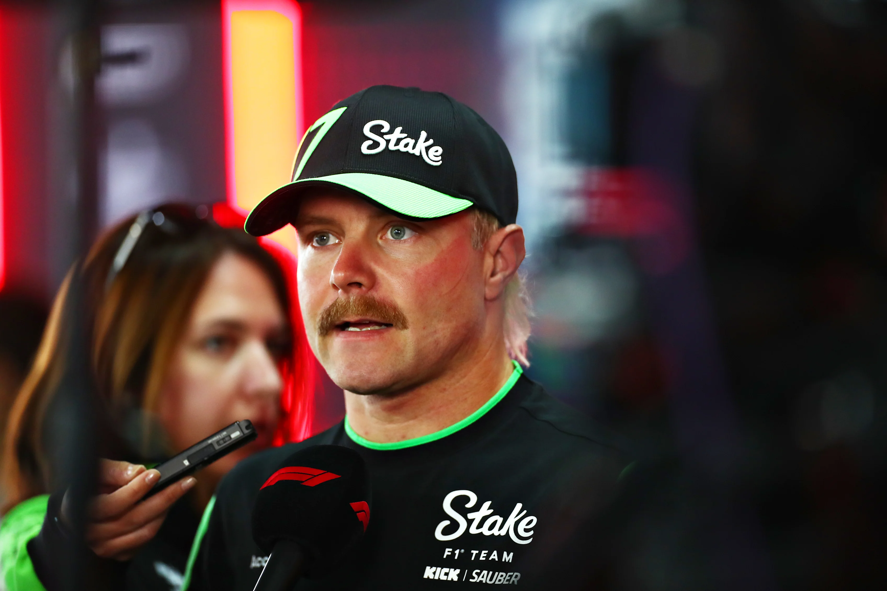MEXICO CITY, MEXICO - OCTOBER 25: Valtteri Bottas of Finland and Stake F1 Team Kick Sauber talks to