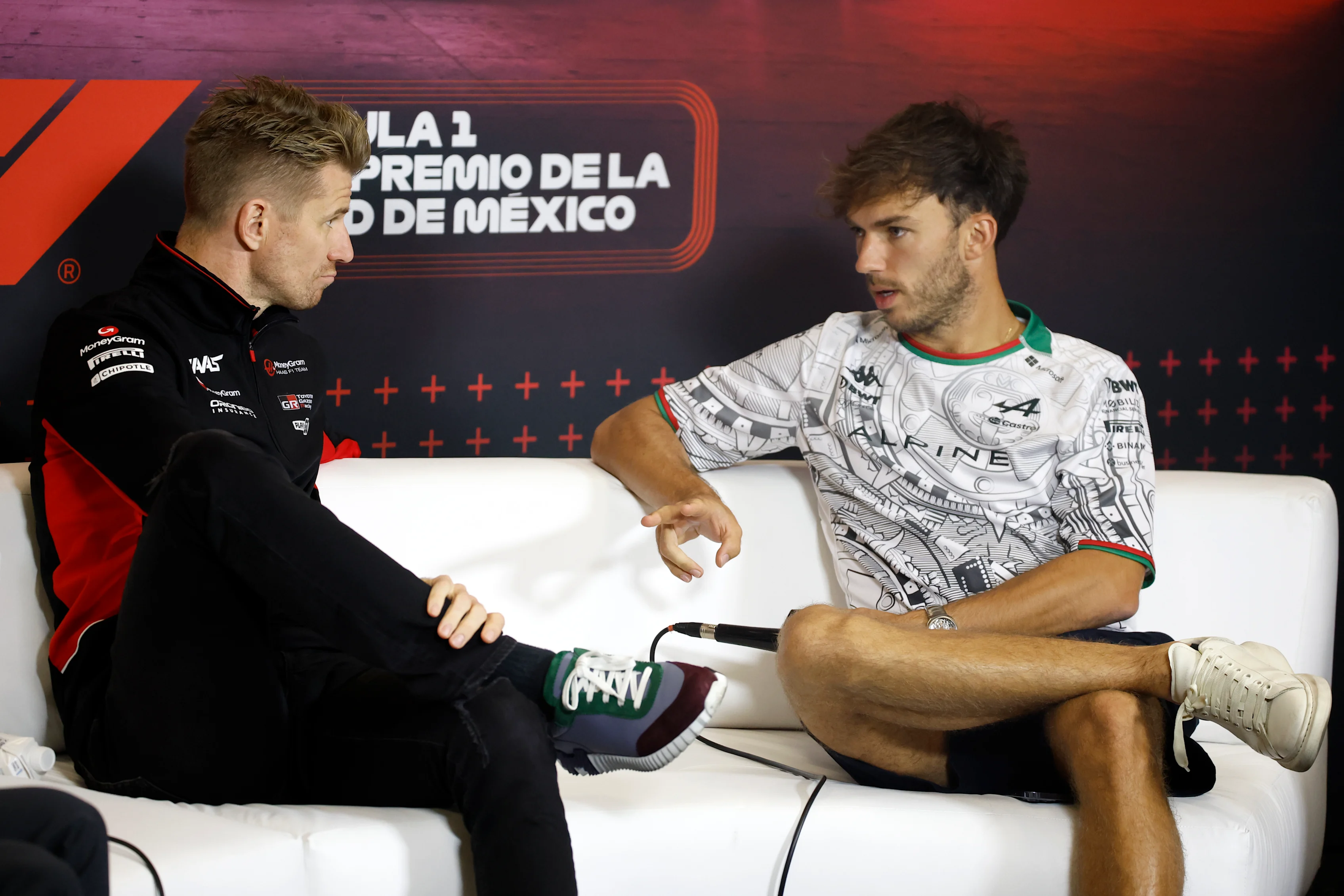 MEXICO CITY, MEXICO - OCTOBER 24: Nico Hulkenberg of Germany and Haas F1 and Pierre Gasly of France and Alpine F1 talk in the Drivers Press Conference during previews ahead of the F1 Grand Prix of Mexico at Autodromo Hermanos Rodriguez on October 24, 2024 in Mexico City, Mexico. (Photo by Chris Graythen/Getty Images)