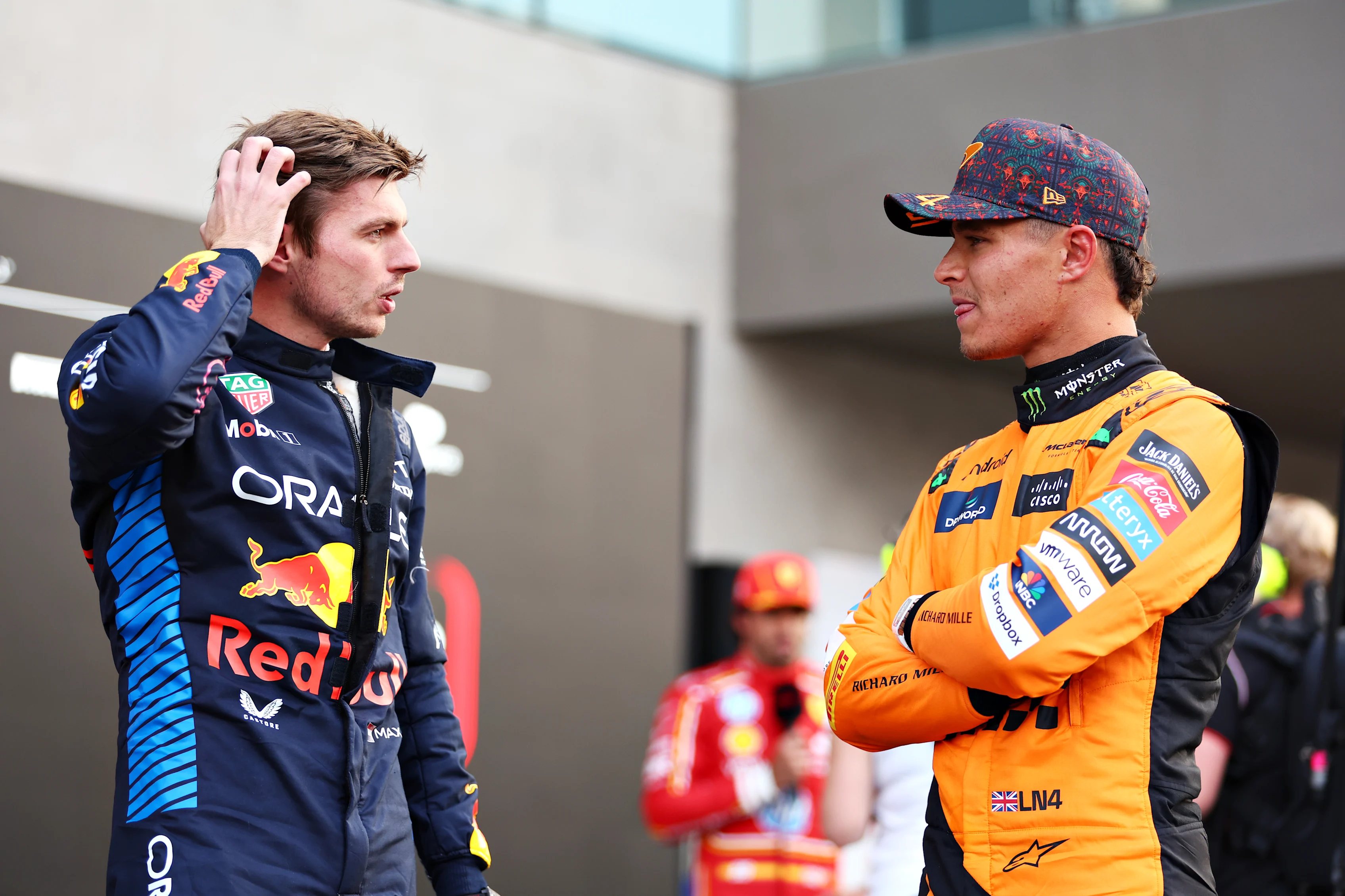 MEXICO CITY, MEXICO - OCTOBER 26: Second placed qualifier Max Verstappen of the Netherlands and Oracle Red Bull Racing talks with Third placed qualifier Lando Norris of Great Britain and McLaren in parc ferme during qualifying ahead of the F1 Grand Prix of Mexico at Autodromo Hermanos Rodriguez on October 26, 2024 in Mexico City, Mexico. (Photo by Bryn Lennon - Formula 1/Formula 1 via Getty Images)