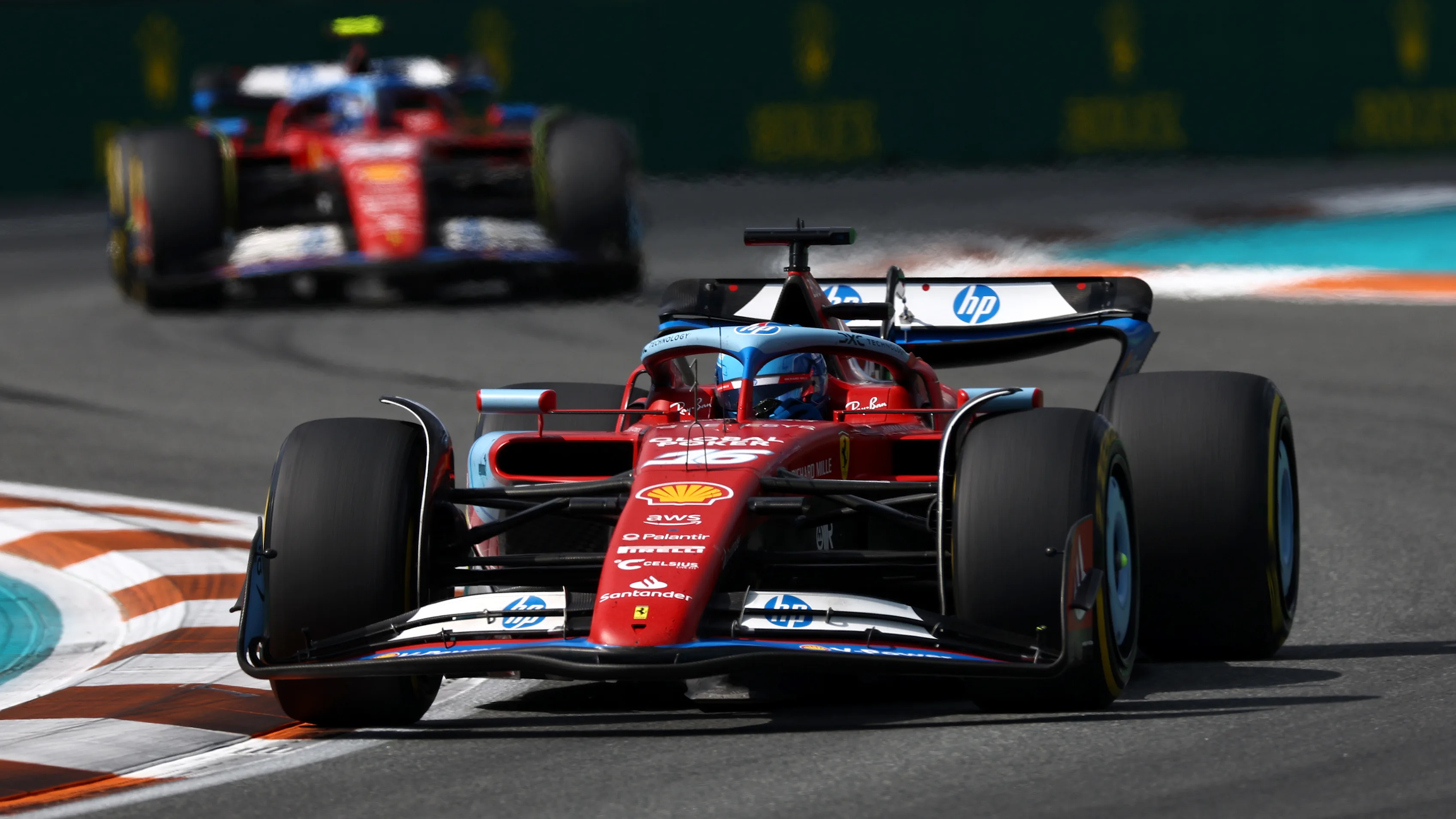 MIAMI, FLORIDA - MAY 05: Charles Leclerc of Monaco driving the (16) Ferrari SF-24 leads Carlos Sainz of Spain driving (55) the Ferrari SF-24 on track  during the F1 Grand Prix of Miami at Miami International Autodrome on May 05, 2024 in Miami, Florida. (Photo by Jared C. Tilton - Formula 1/Formula 1 via Getty Images)