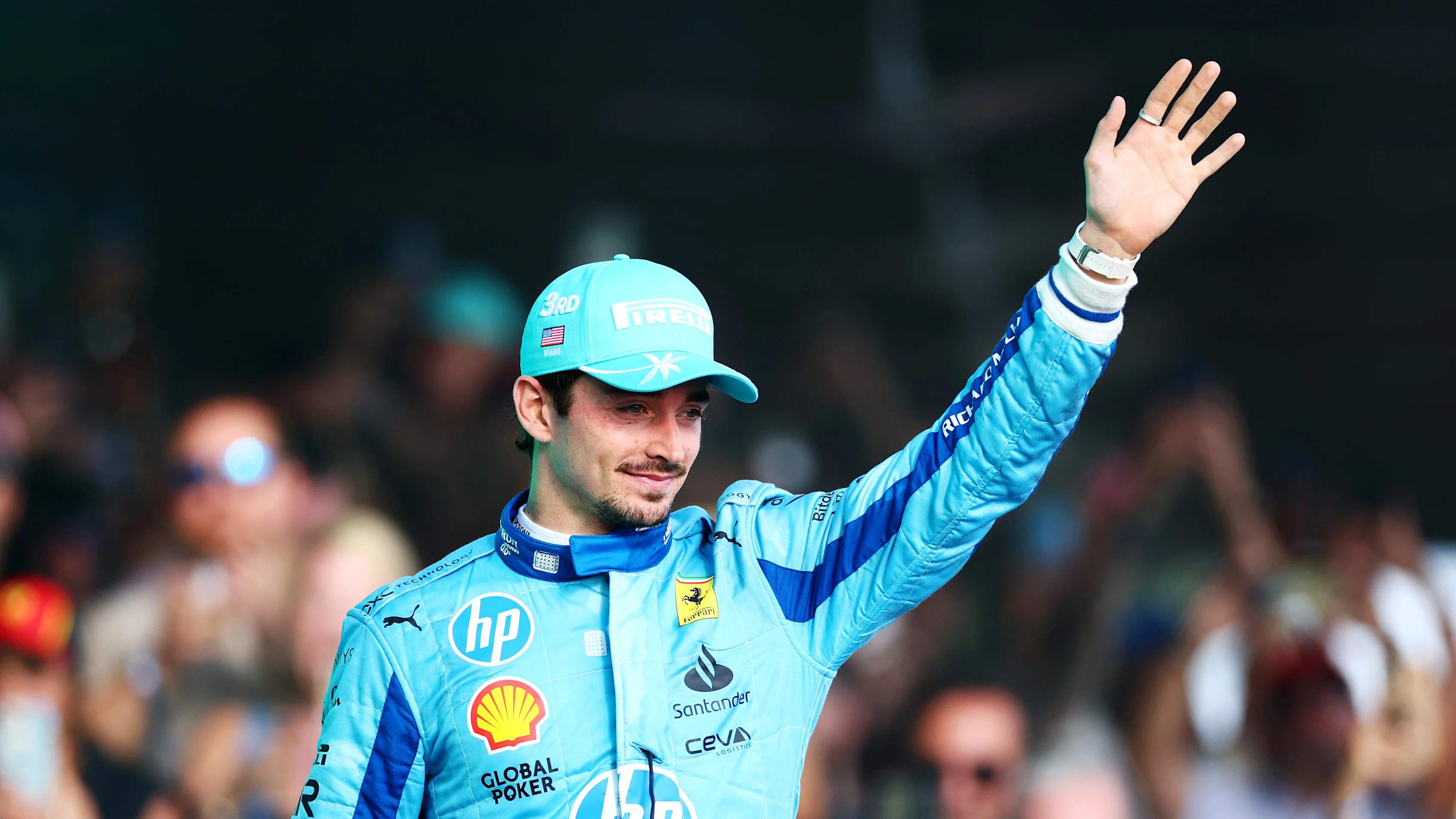 MIAMI, FLORIDA - MAY 05: Charles Leclerc of Monaco and Ferrari celebrates on the podium following