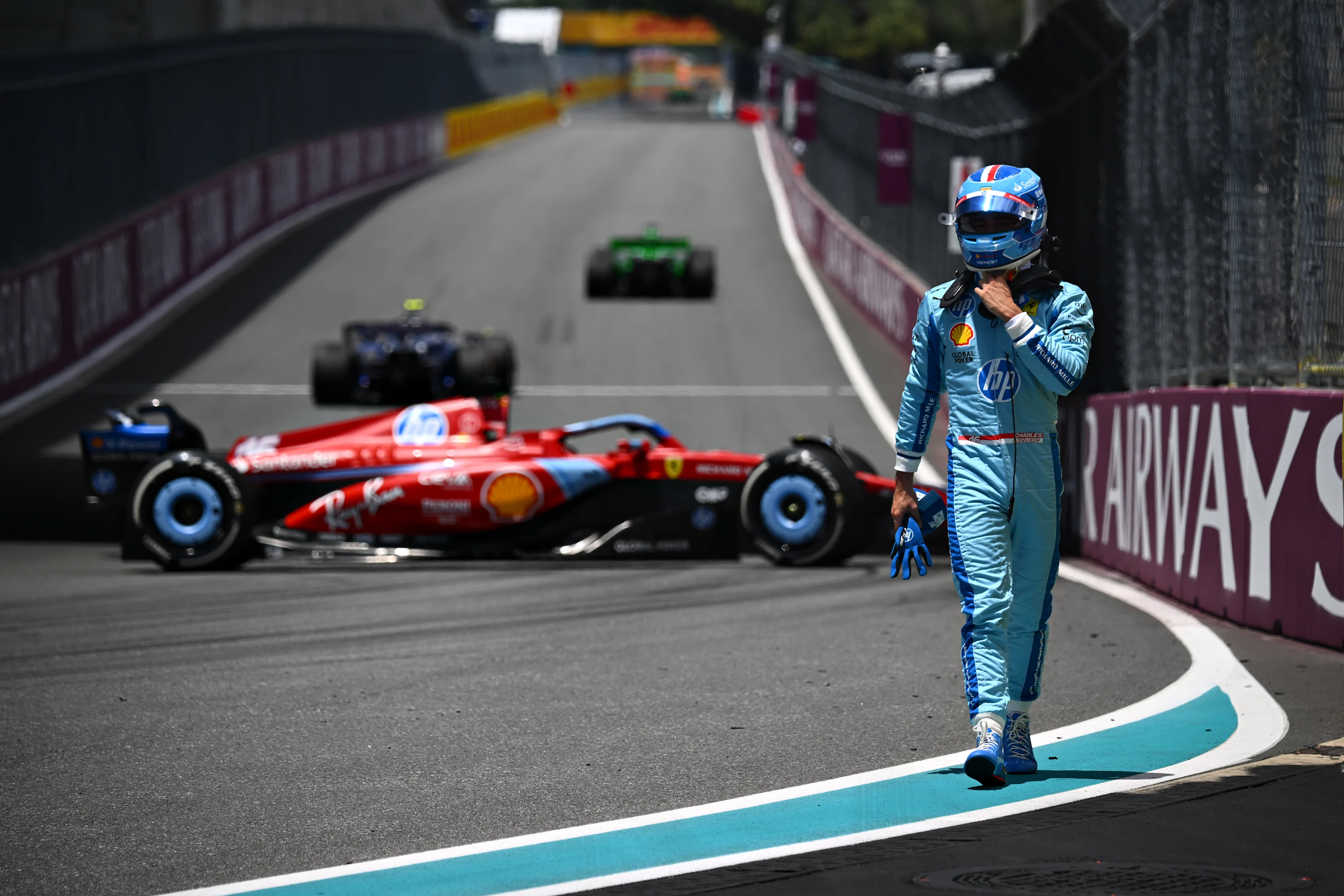 MIAMI, FLORIDA - MAY 03: Charles Leclerc of Monaco and Ferrari walks from his car after spinning on track during practice ahead of the F1 Grand Prix of Miami at Miami International Autodrome on May 03, 2024 in Miami, Florida. (Photo by Clive Mason/Getty Images)