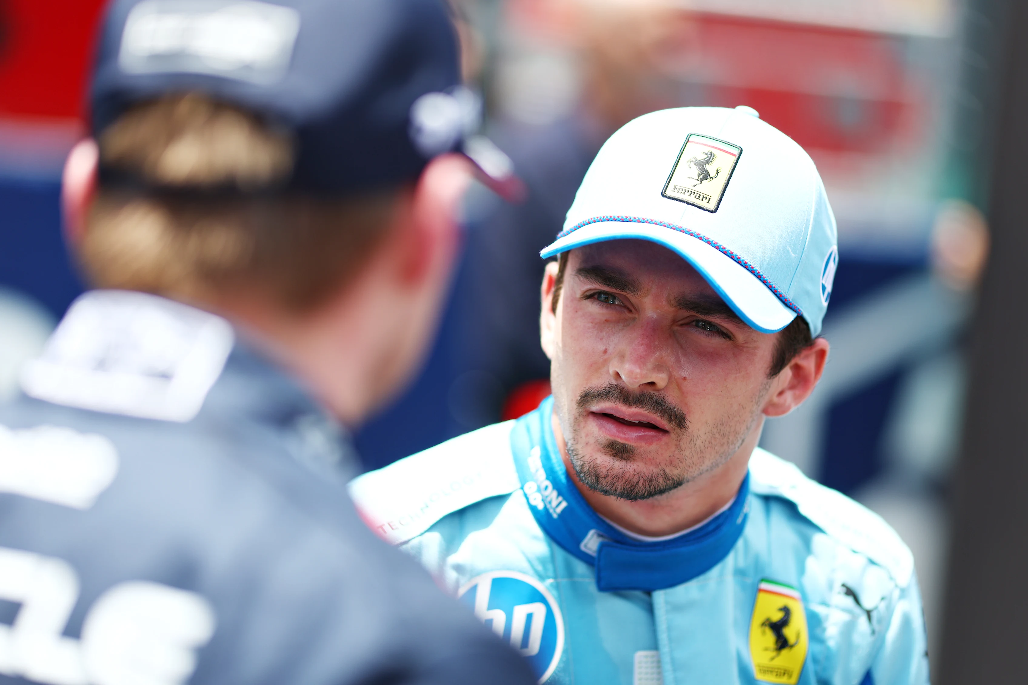 MIAMI, FLORIDA - MAY 04: Second placed Charles Leclerc of Monaco and Ferrari talks with sprint