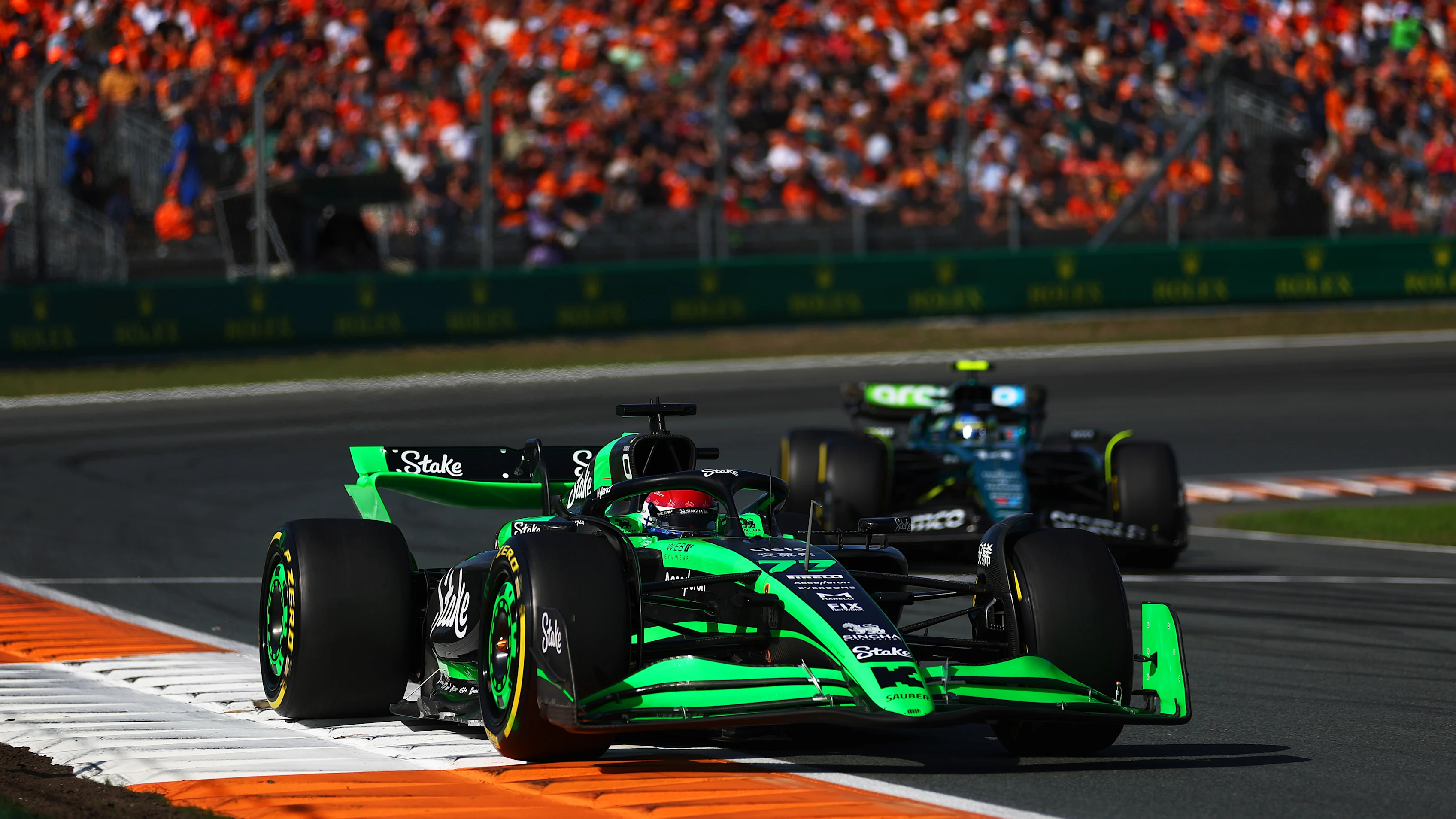 ZANDVOORT, NETHERLANDS - AUGUST 23: Valtteri Bottas of Finland driving the (77) Kick Sauber C44 Ferrari leads Fernando Alonso of Spain driving the (14) Aston Martin AMR24 Mercedes during practice ahead of the F1 Grand Prix of Netherlands at Circuit Zandvoort on August 23, 2024 in Zandvoort, Netherlands. (Photo by Bryn Lennon - Formula 1/Formula 1 via Getty Images)