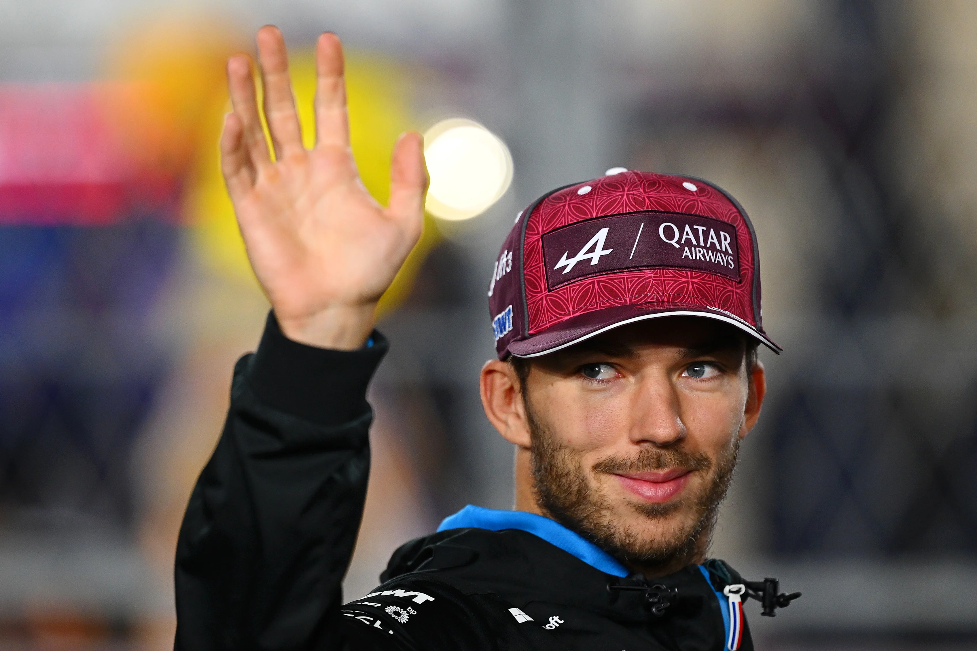 QATAR - DECEMBER 01: Pierre Gasly of France and Alpine F1 waves to the crowd on the drivers parade prior to the F1 Grand Prix of Qatar at Lusail International Circuit on December 01, 2024 in Lusail City, Qatar. (Photo by Clive Mason/Getty Images)