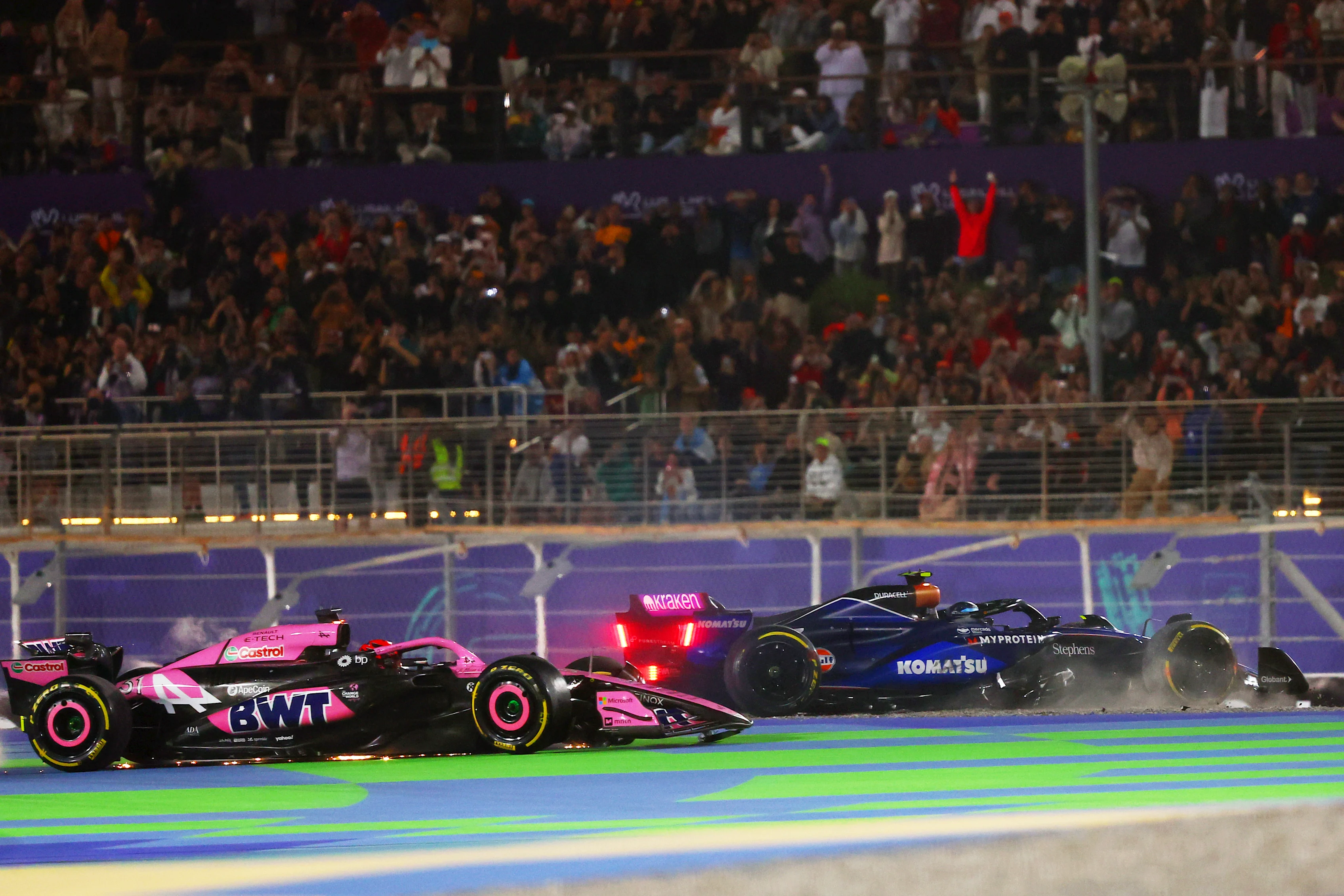 Esteban Ocon of France and Alpine F1 and Franco Colapinto of Argentina and Williams crash at the start during the F1 Grand Prix of Qatar at Lusail International Circuit on December 01, 2024 in Lusail City, Qatar. (Photo by Joe Portlock/Getty Images)