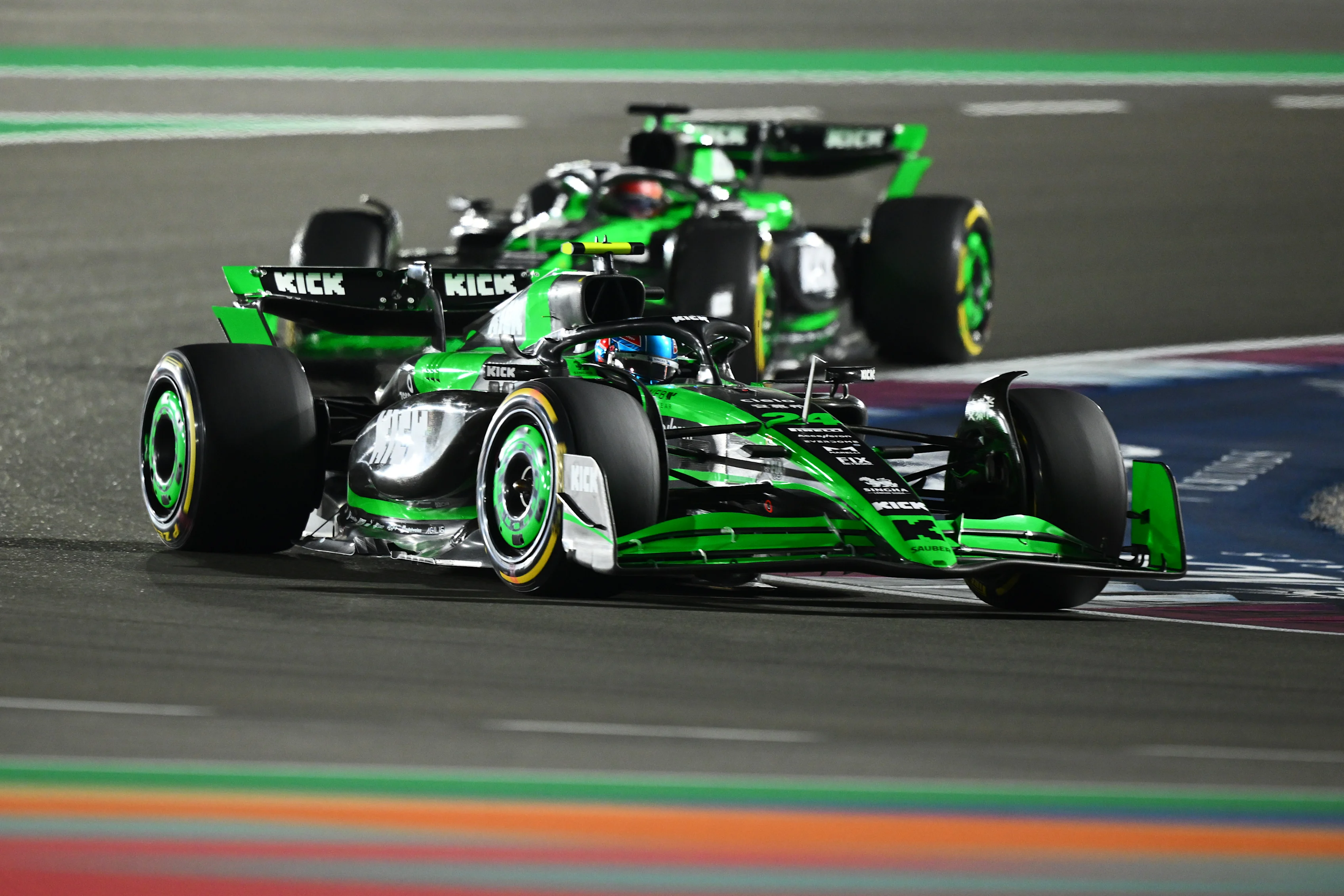 Zhou Guanyu leads Valtteri Bottas of Finland driving the (77) Kick Sauber C44 Ferrari on track during the F1 Grand Prix of Qatar at Lusail International Circuit on December 01, 2024 in Lusail City, Qatar. (Photo by Clive Mason/Getty Images)