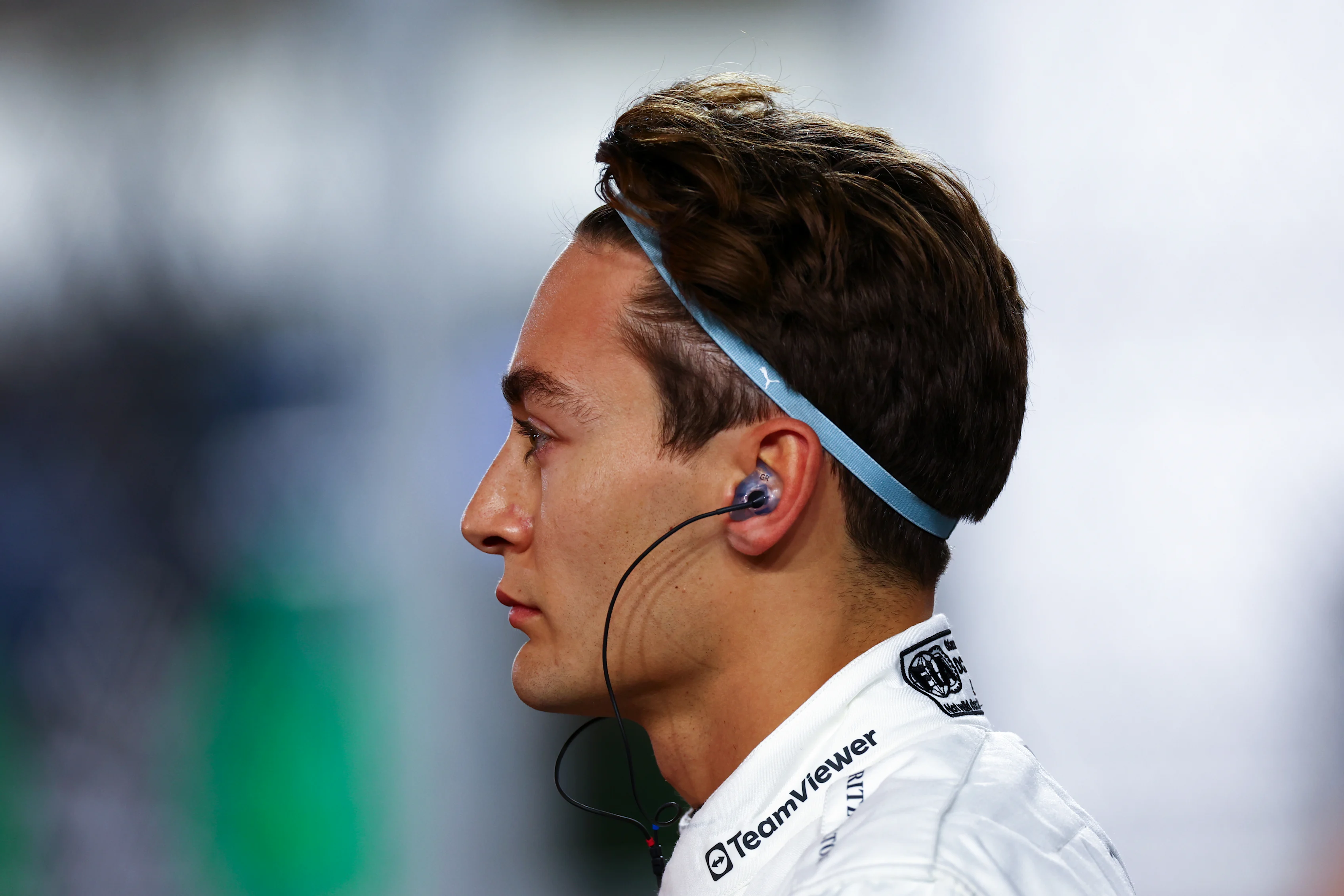 LUSAIL CITY, QATAR - DECEMBER 01: George Russell of Great Britain and Mercedes looks on on the grid
