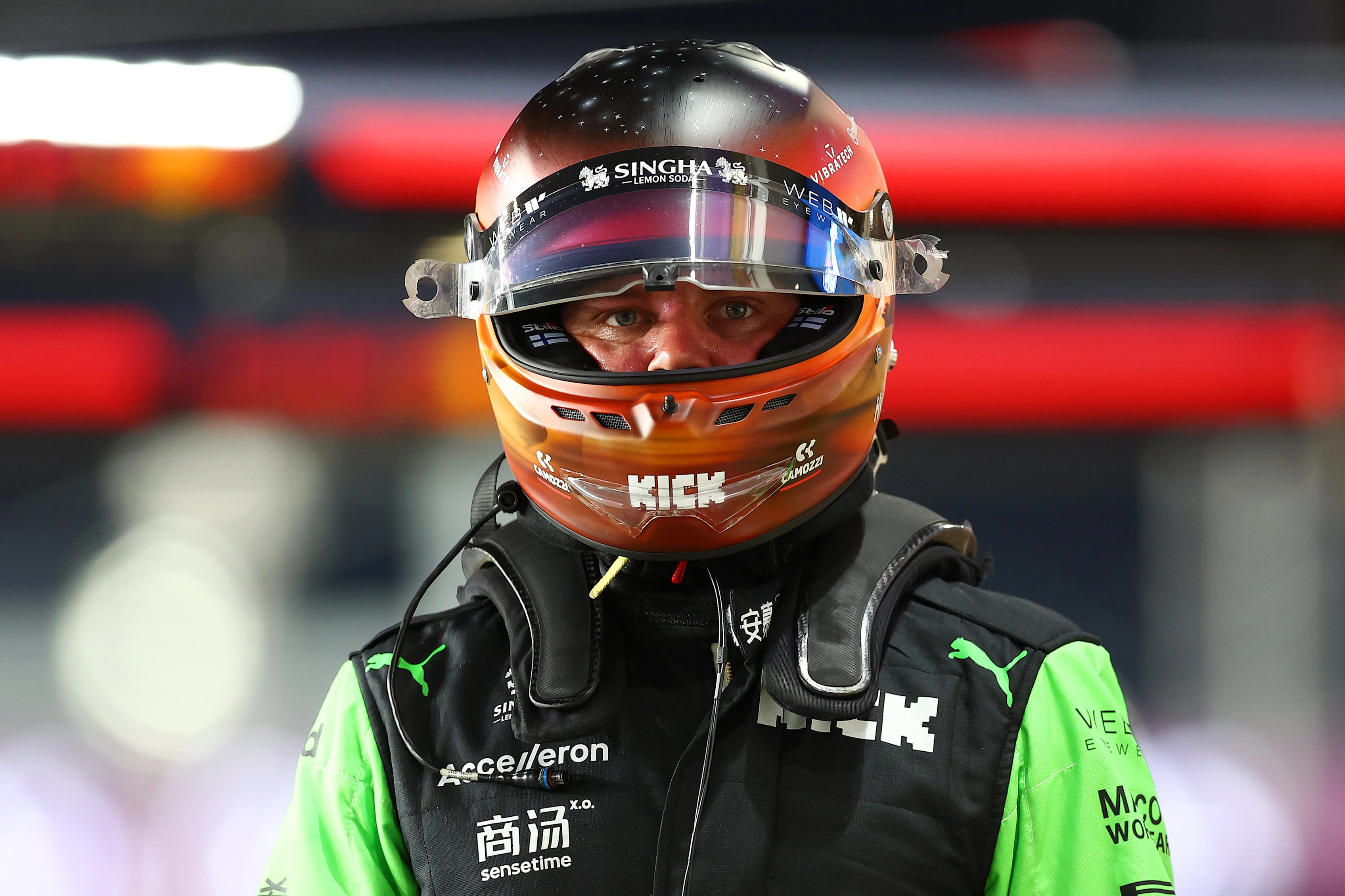 LUSAIL CITY, QATAR - NOVEMBER 29: 13th placed qualifier Valtteri Bottas of Finland and Stake F1 Team Kick Sauber walks in parc ferme during Sprint Qualifying ahead of the F1 Grand Prix of Qatar at Lusail International Circuit on November 29, 2024 in Lusail City, Qatar. (Photo by Bryn Lennon - Formula 1/Formula 1 via Getty Images)