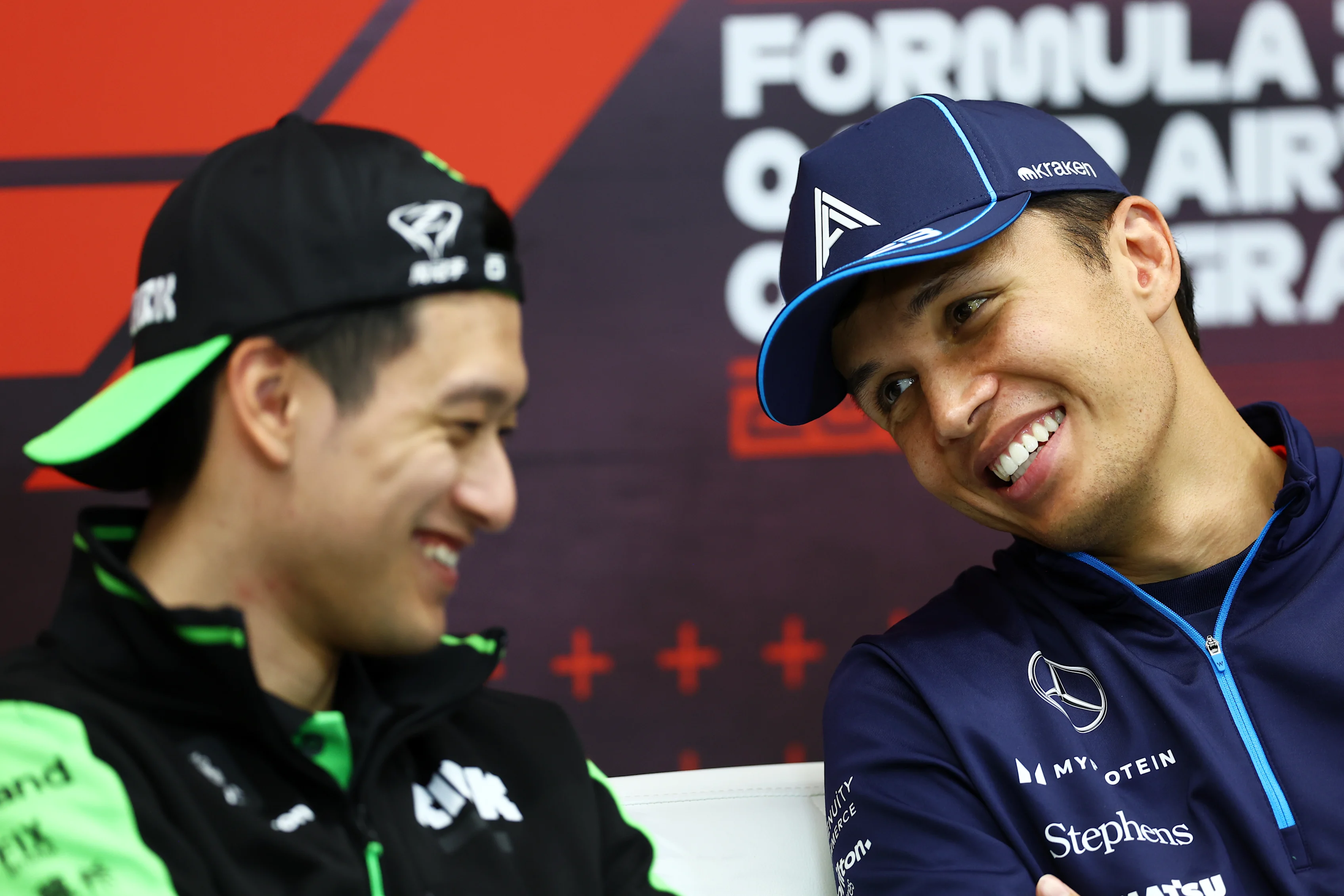 LUSAIL CITY, QATAR - NOVEMBER 28: Alexander Albon of Thailand and Williams and Zhou Guanyu of China and Stake F1 Team Kick Sauber attend the Drivers Press Conference during previews ahead of the F1 Grand Prix of Qatar at Lusail International Circuit on November 28, 2024 in Lusail City, Qatar. (Photo by Bryn Lennon/Getty Images)