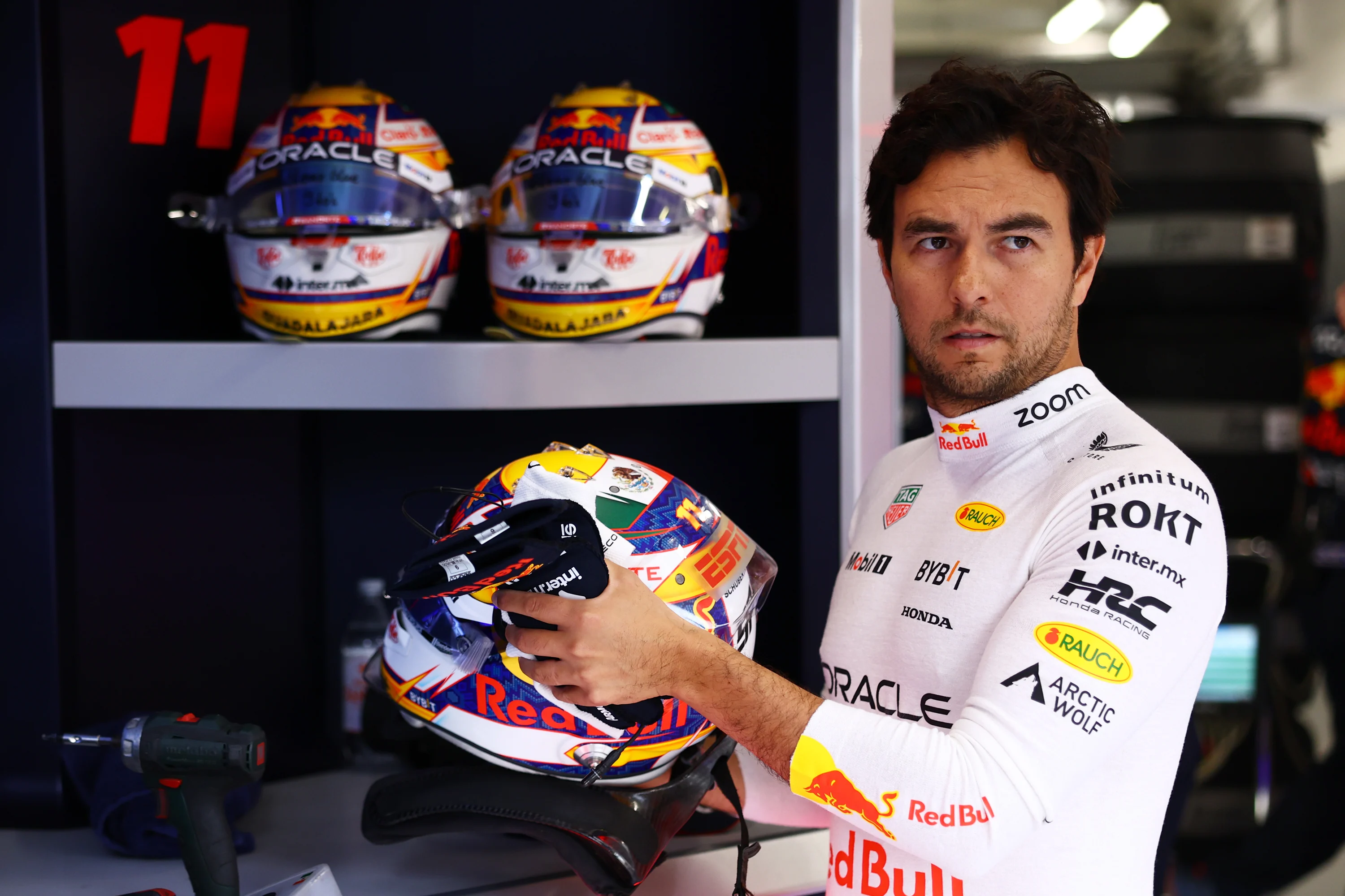 LUSAIL CITY, QATAR - NOVEMBER 30: Sergio Perez of Mexico and Oracle Red Bull Racing prepares to