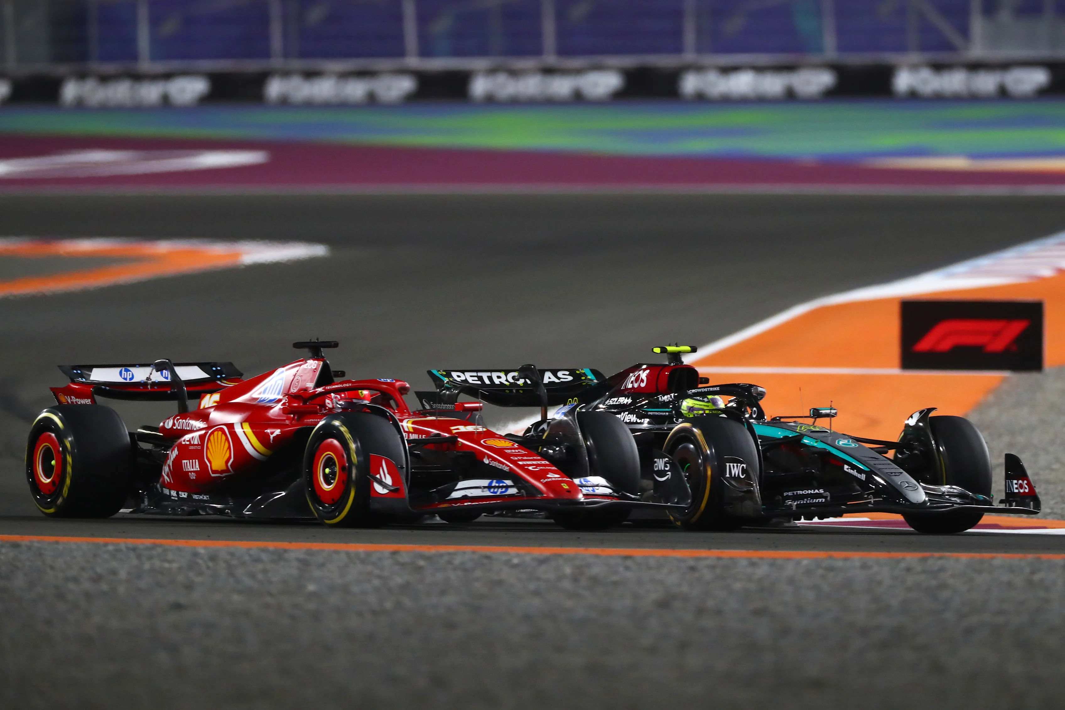 Charles Leclerc and Lewis Hamilton battle for track position during the Sprint ahead of the F1 Grand Prix of Qatar at Lusail International Circuit on November 30, 2024 in Lusail City, Qatar. (Photo by Peter Fox/Getty Images)