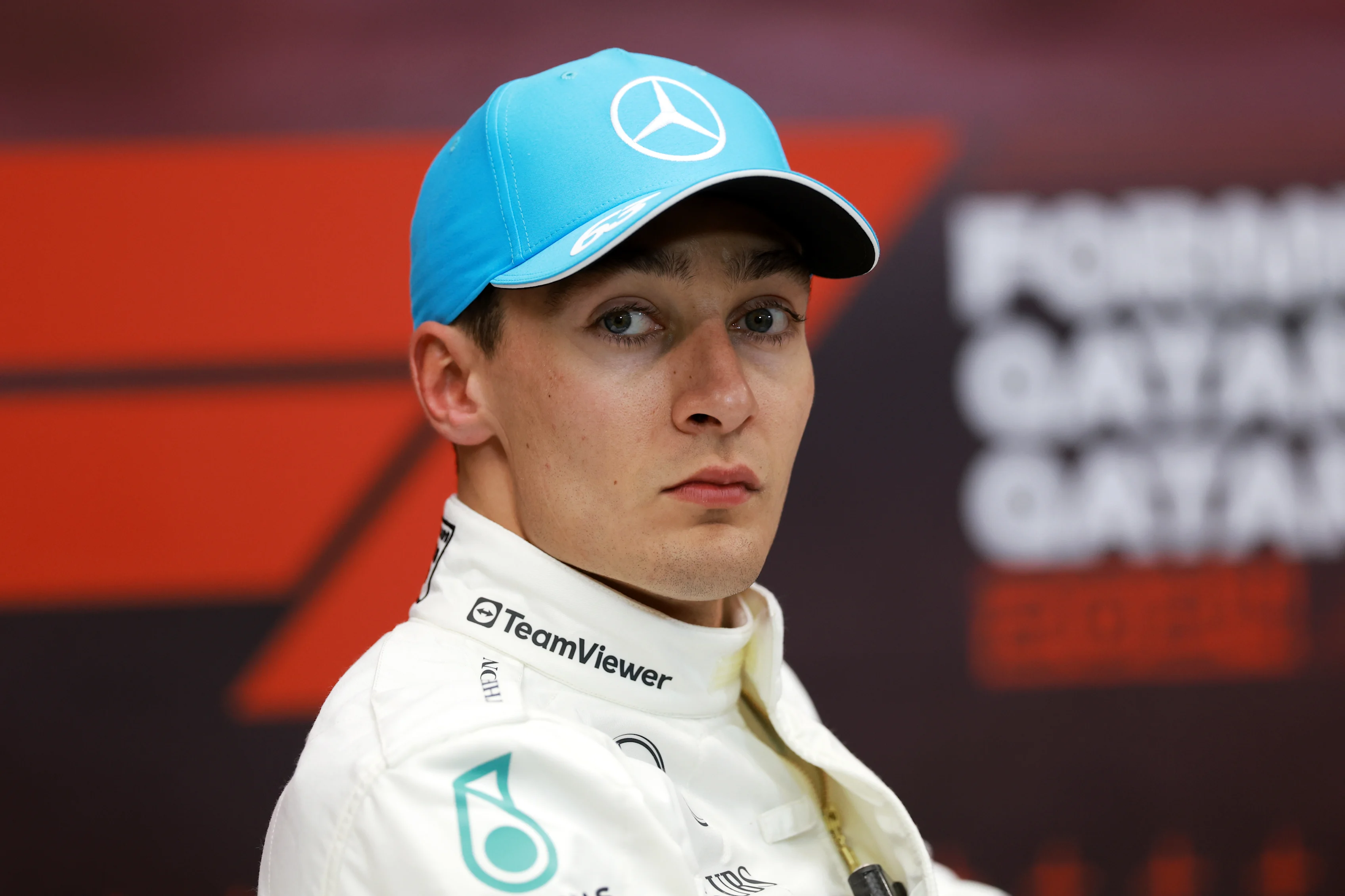 LUSAIL CITY, QATAR - NOVEMBER 30: Second placed qualifier George Russell of Great Britain and Mercedes attends the press conference after qualifying ahead of the F1 Grand Prix of Qatar at Lusail International Circuit on November 30, 2024 in Lusail City, Qatar. (Photo by Bryn Lennon/Getty Images)