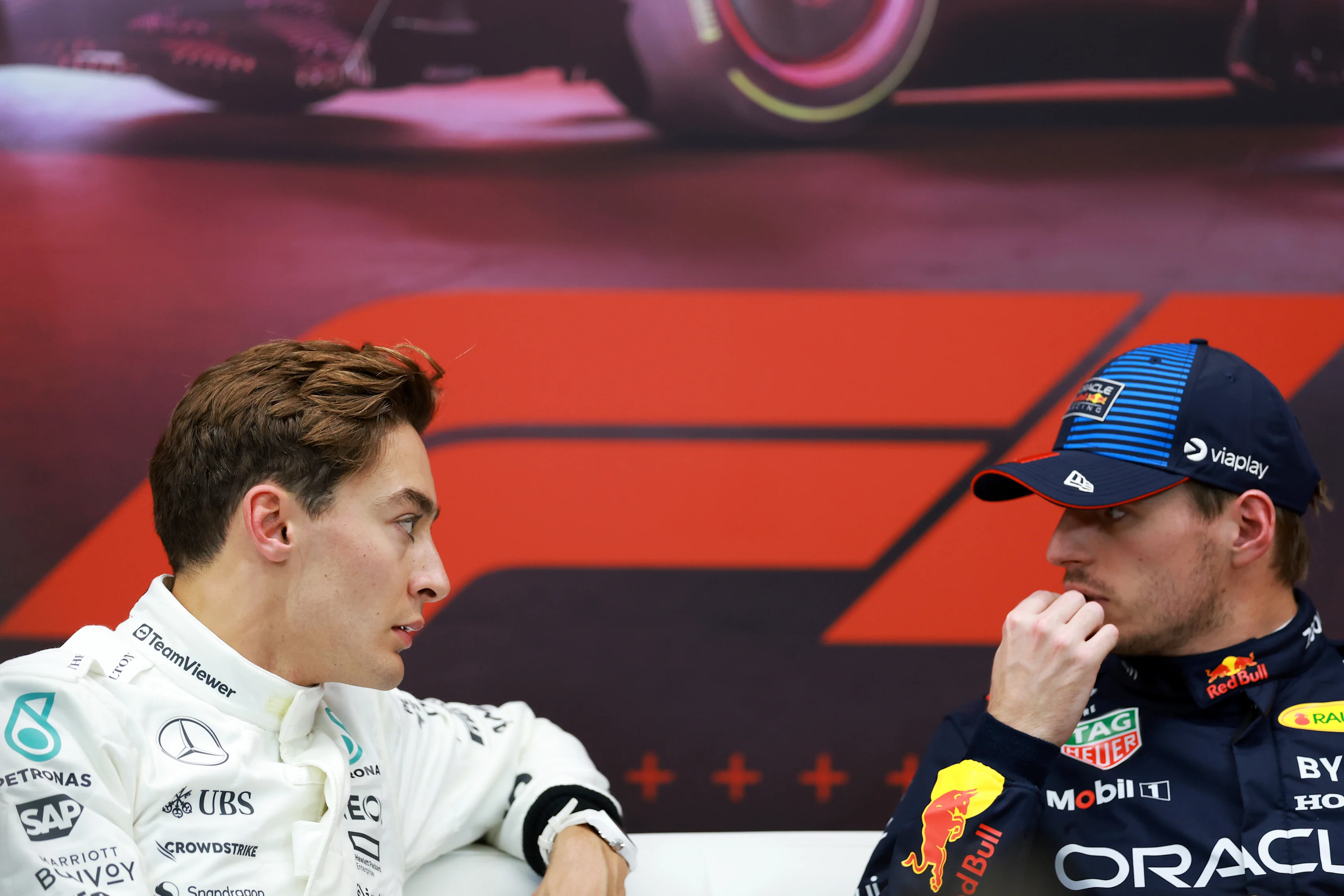 Pole position qualifier Max Verstappen and Second placed qualifier George Russell attend the press conference after qualifying at Lusail International Circuit on November 30, 2024 in Lusail City, Qatar. (Photo by Bryn Lennon/Getty Images)