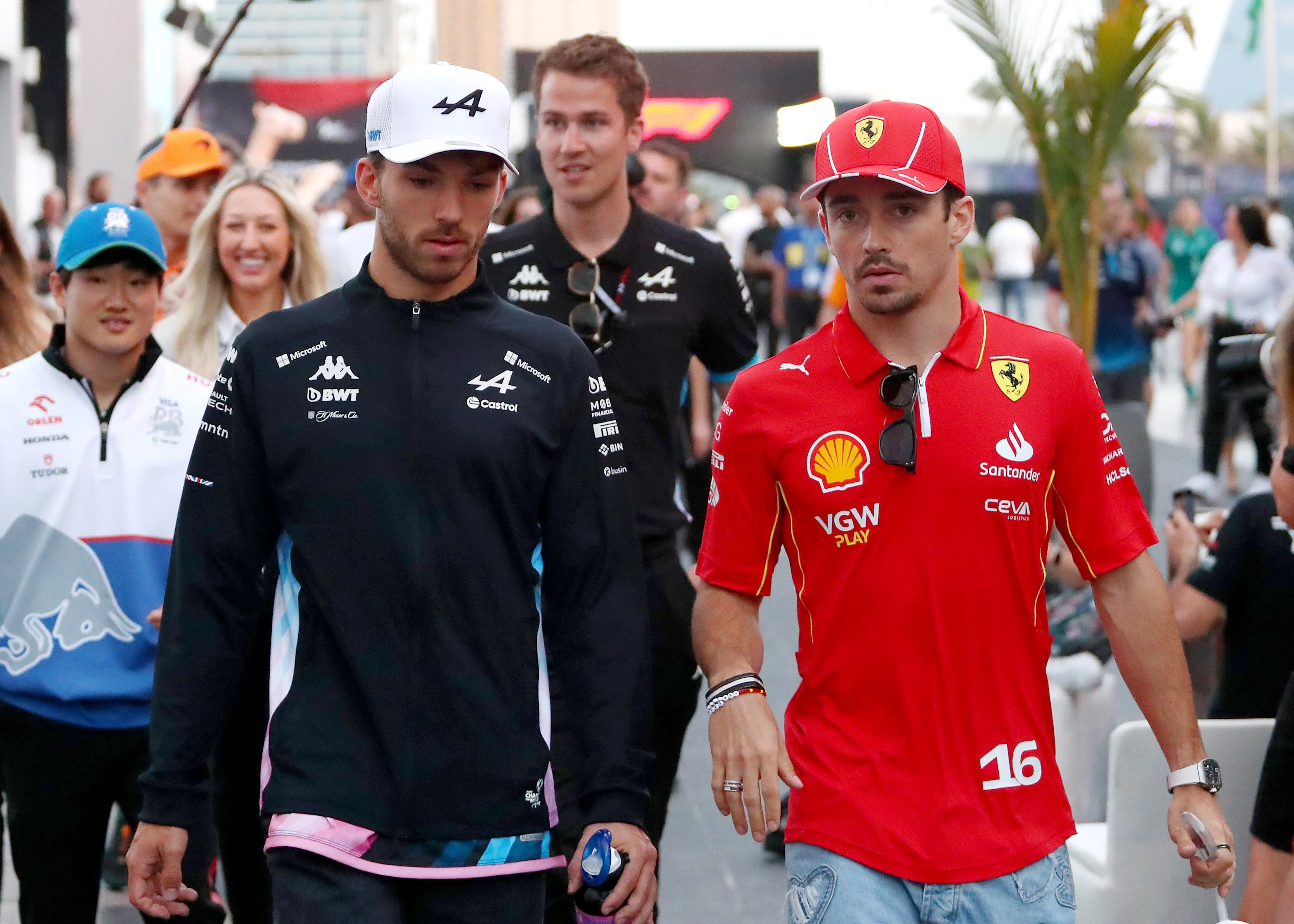 JEDDAH, SAUDI ARABIA - MARCH 09: Pierre Gasly of France and Alpine F1 and Charles Leclerc of Monaco and Ferrari talk in the Paddock prior to the F1 Grand Prix of Saudi Arabia at Jeddah Corniche Circuit on March 09, 2024 in Jeddah, Saudi Arabia. (Photo by Peter Fox - Formula 1/Formula 1 via Getty Images)