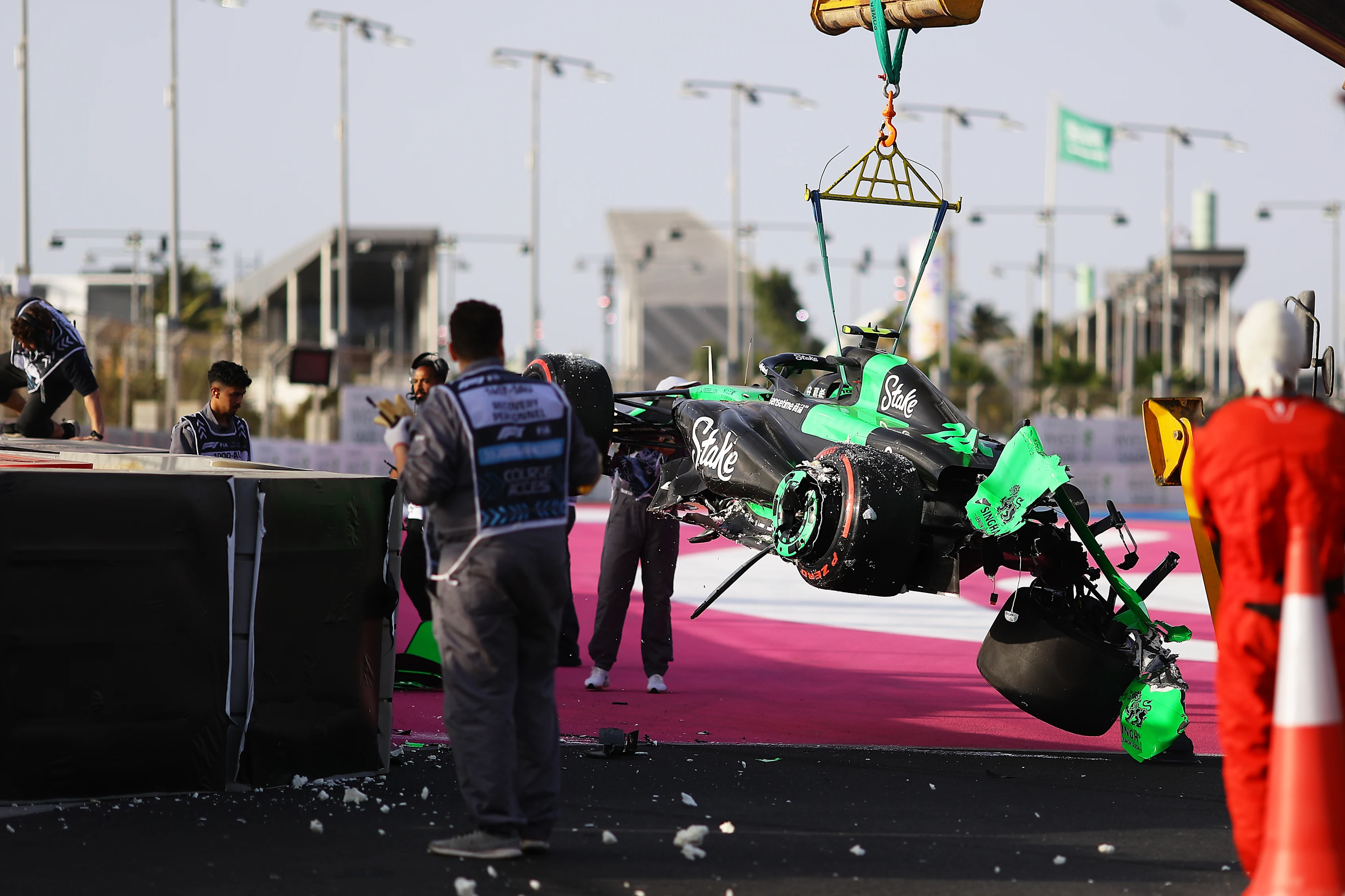 JEDDAH, SAUDI ARABIA - MARCH 08: The car of Zhou Guanyu of China and Stake F1 Team Kick Sauber is removed from the circuit after a crash causing a red flag during final practice ahead of the F1 Grand Prix of Saudi Arabia at Jeddah Corniche Circuit on March 08, 2024 in Jeddah, Saudi Arabia. (Photo by Joe Portlock - Formula 1/Formula 1 via Getty Images)