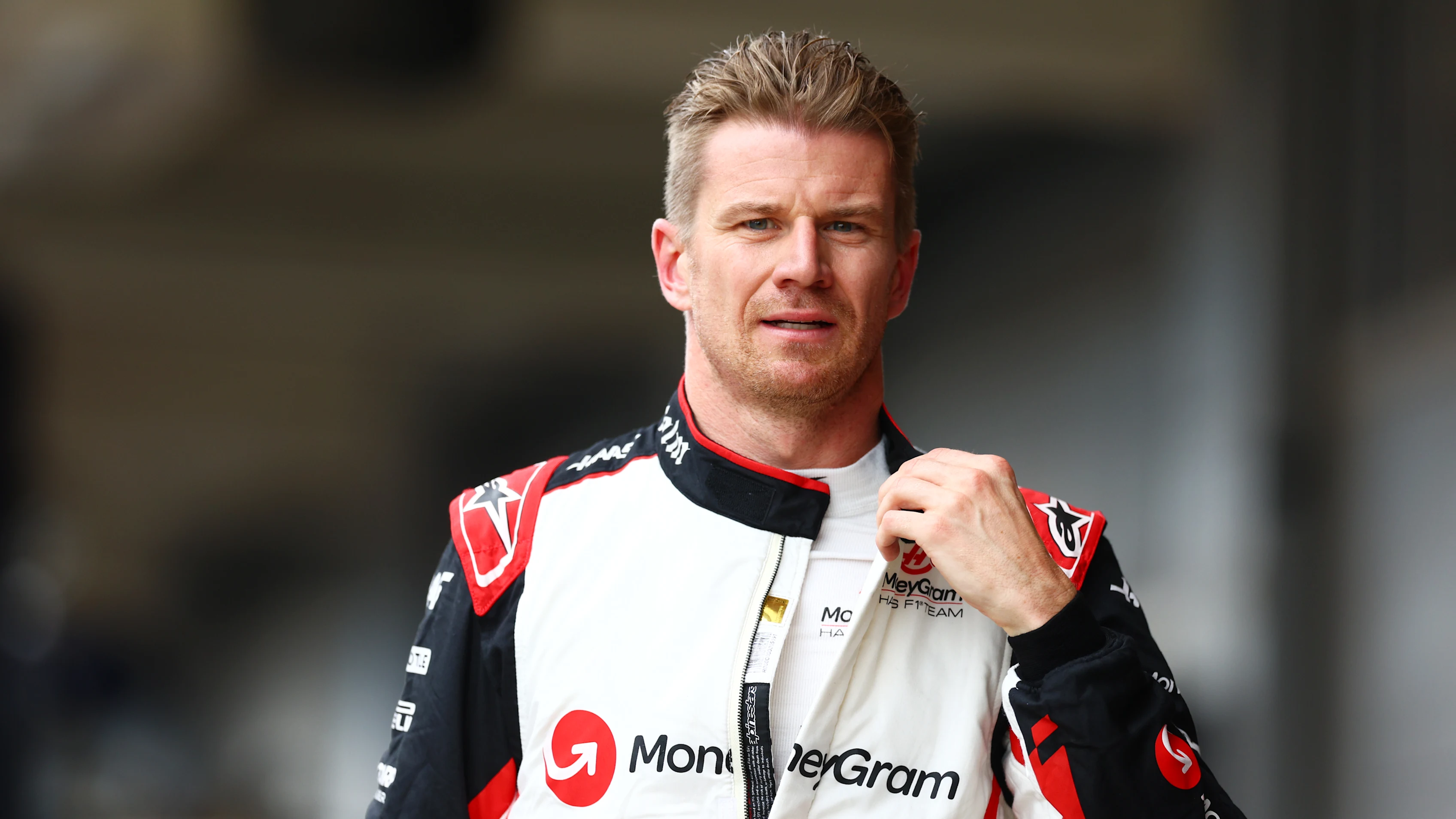 BARCELONA, SPAIN - JUNE 22: 13th placed qualifier Nico Hulkenberg of Germany and Haas F1 walks in the Pitlane during qualifying ahead of the F1 Grand Prix of Spain at Circuit de Barcelona-Catalunya on June 22, 2024 in Barcelona, Spain. (Photo by Clive Rose - Formula 1/Formula 1 via Getty Images)