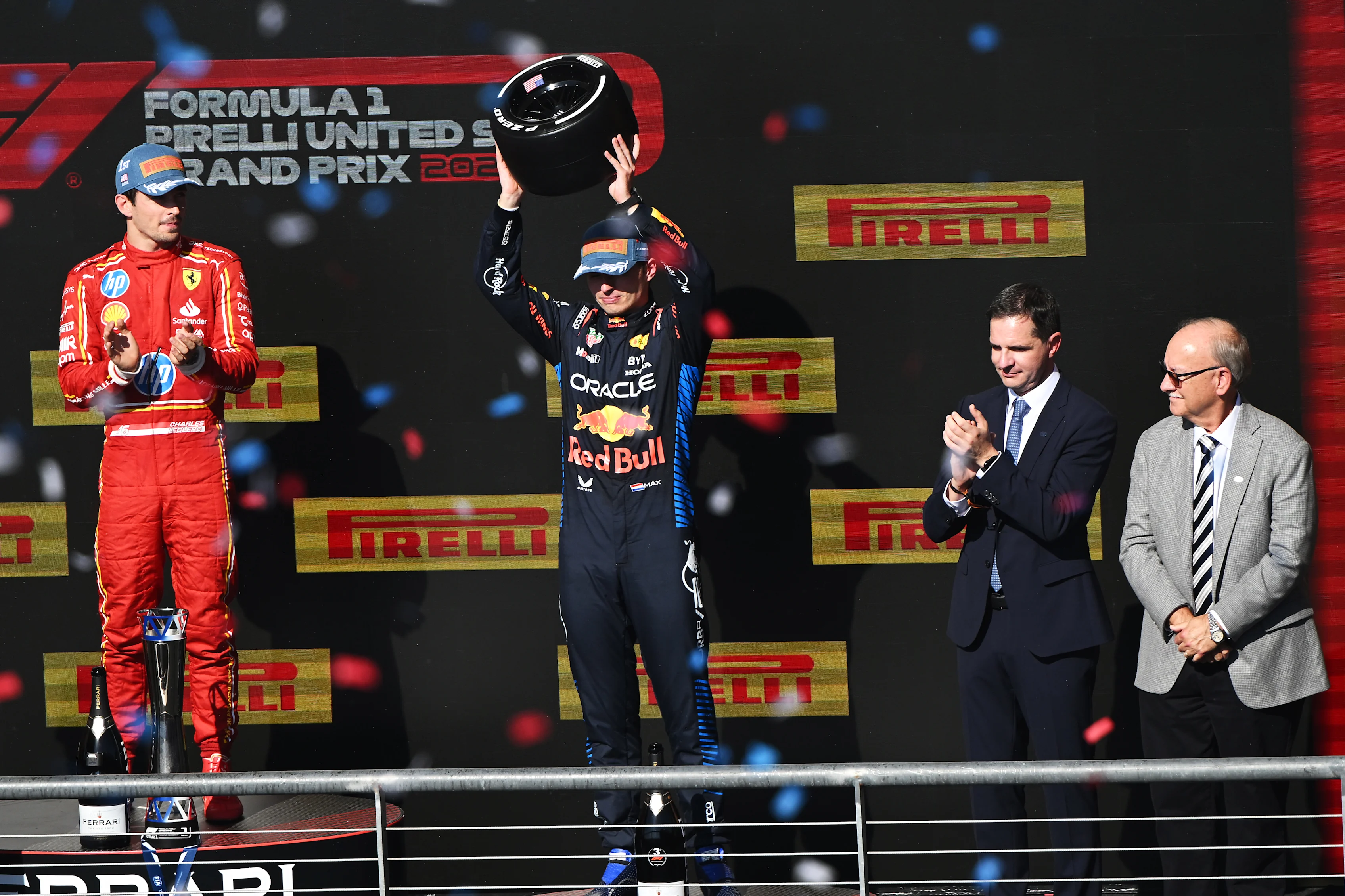 AUSTIN, TEXAS - OCTOBER 20: Third placed Max Verstappen of Oracle Red Bull Racing celebrates on the podium after the F1 Grand Prix of United States at Circuit of The Americas on October 20, 2024 in Austin, Texas. (Photo by Mark Sutton/Getty Images)