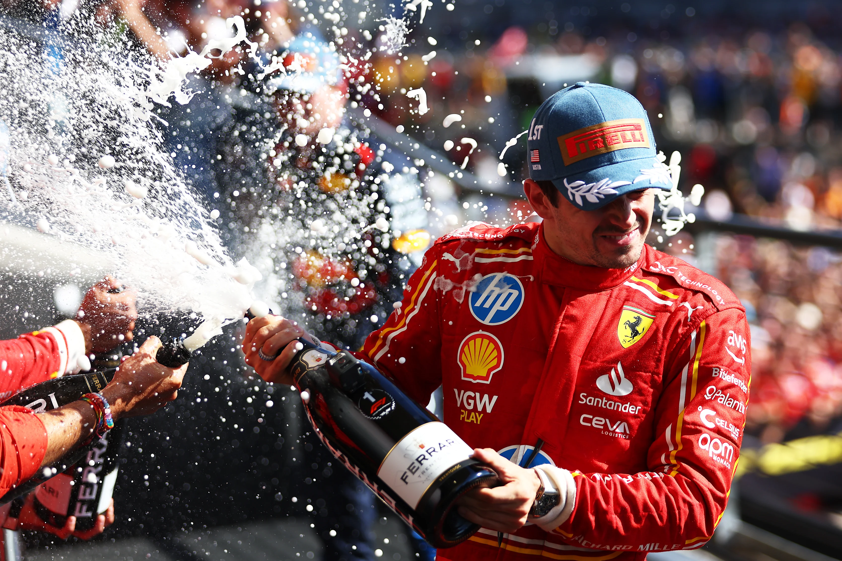AUSTIN, TEXAS - OCTOBER 20: Race winner Charles Leclerc of Monaco and Ferrari celebrates on the podium during the F1 Grand Prix of United States at Circuit of The Americas on October 20, 2024 in Austin, Texas. (Photo by Bryn Lennon - Formula 1/Formula 1 via Getty Images)