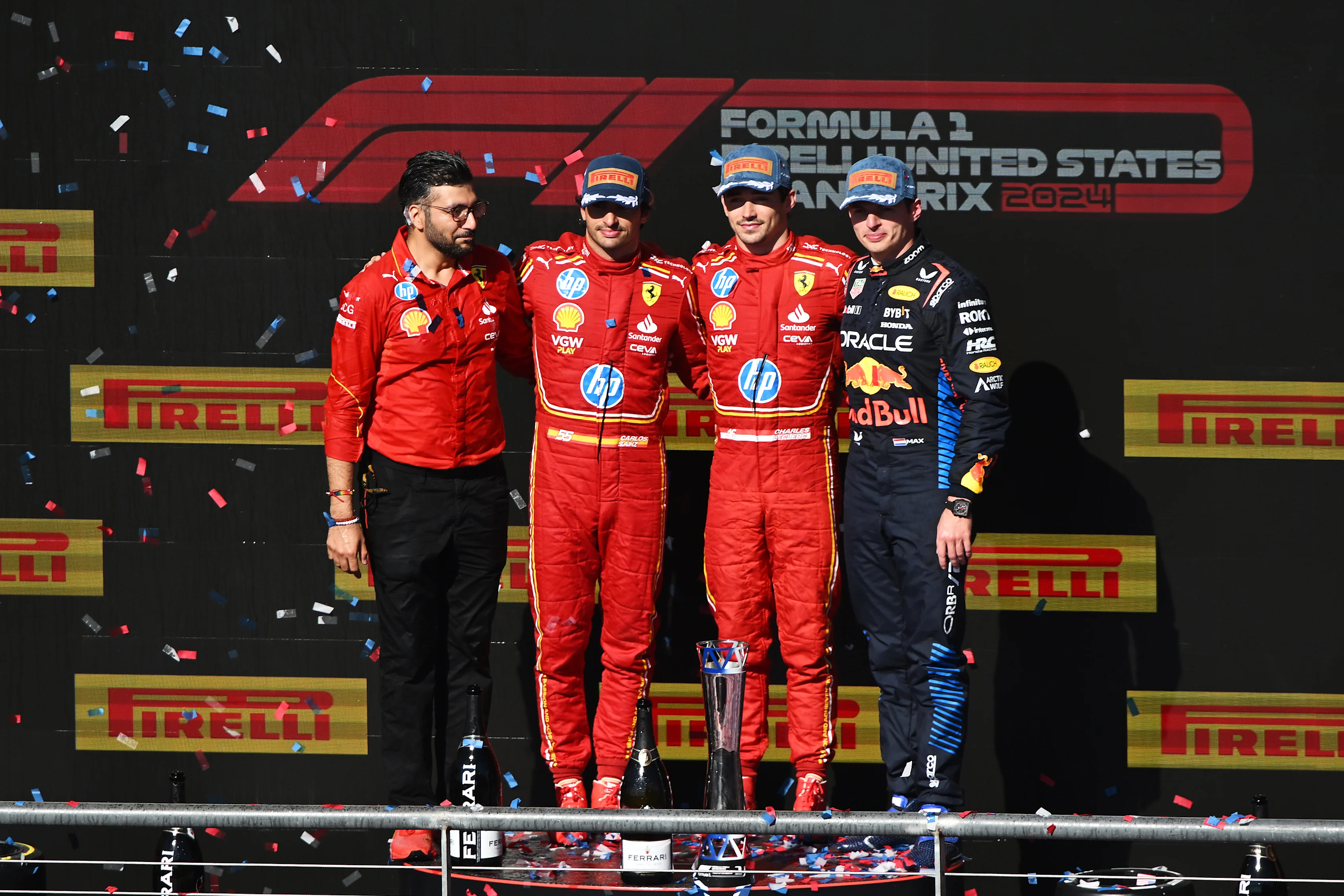 AUSTIN, TEXAS - OCTOBER 20: Race winner Charles Leclerc, Second placed Carlos Sainz and Third placed Max Verstappen pose for a photo on the podium after the F1 Grand Prix of United States on October 20, 2024 in Austin. (Photo by Mark Sutton/Getty Images)