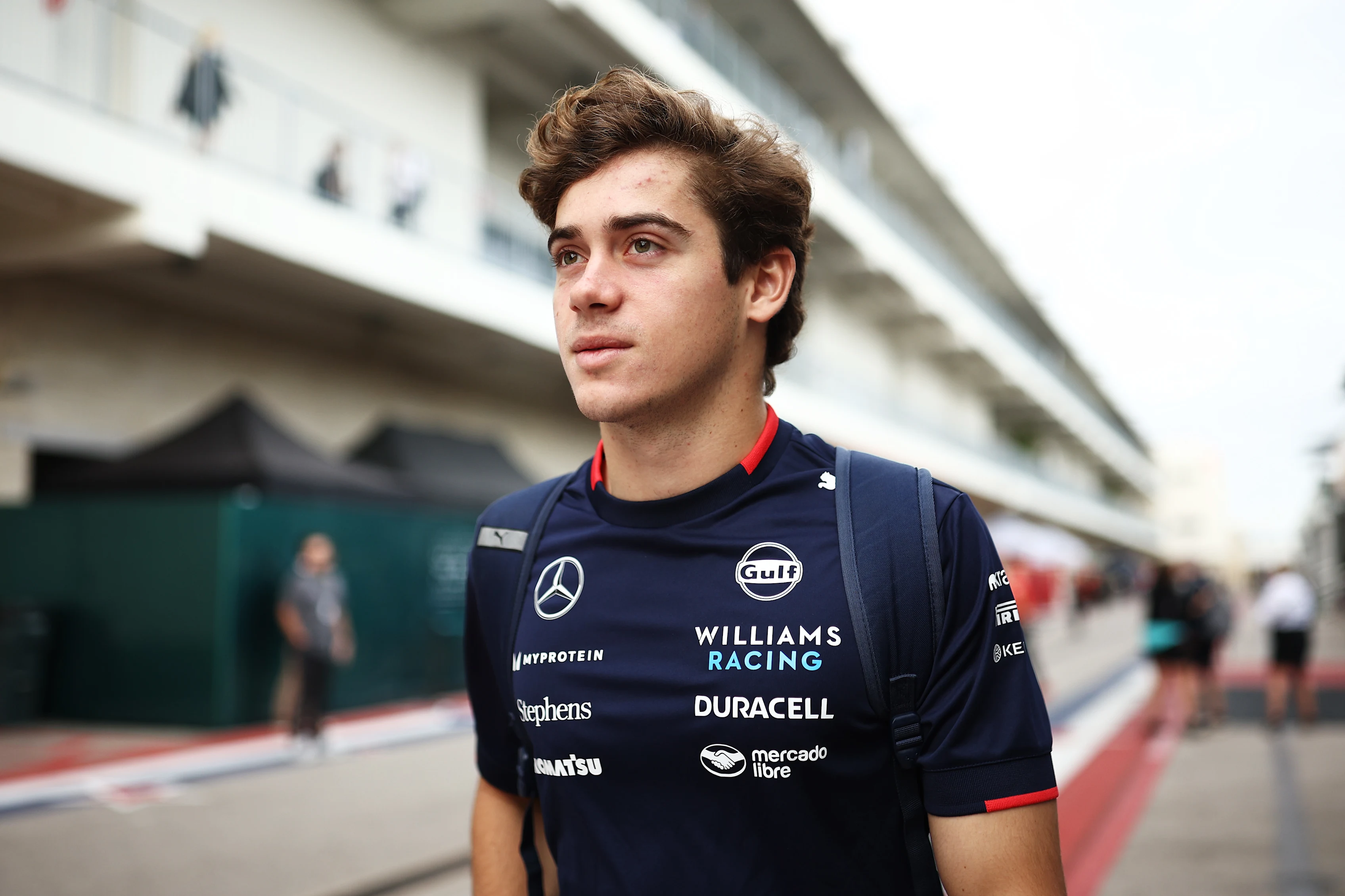 AUSTIN, TEXAS - OCTOBER 18: Franco Colapinto of Argentina and Williams walks in the Paddock prior