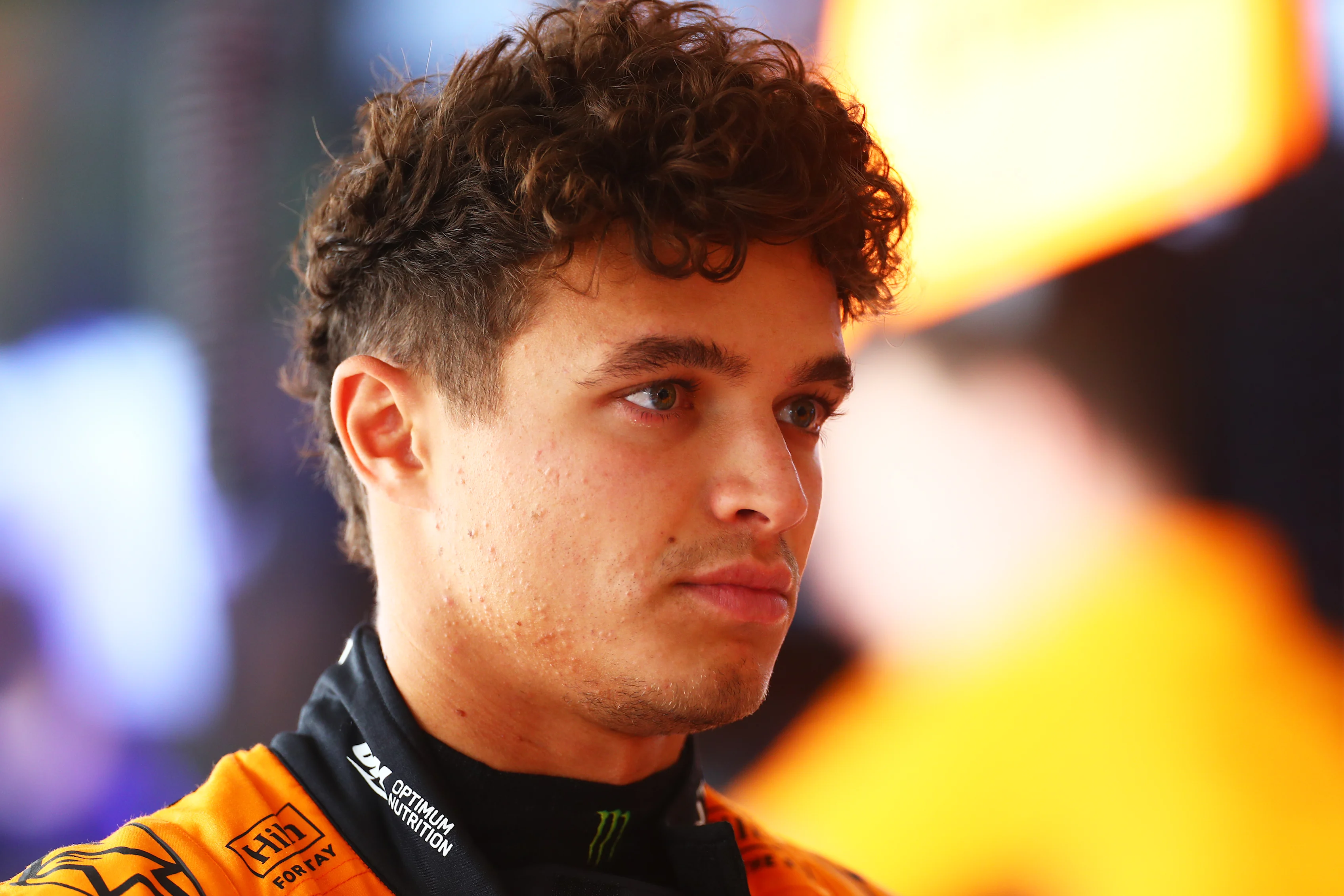 AUSTIN, TEXAS - OCTOBER 18: Lando Norris of Great Britain and McLaren looks on in the garage during practice ahead of the F1 Grand Prix of United States at Circuit of The Americas on October 18, 2024 in Austin, Texas. (Photo by Peter Fox - Formula 1/Formula 1 via Getty Images)