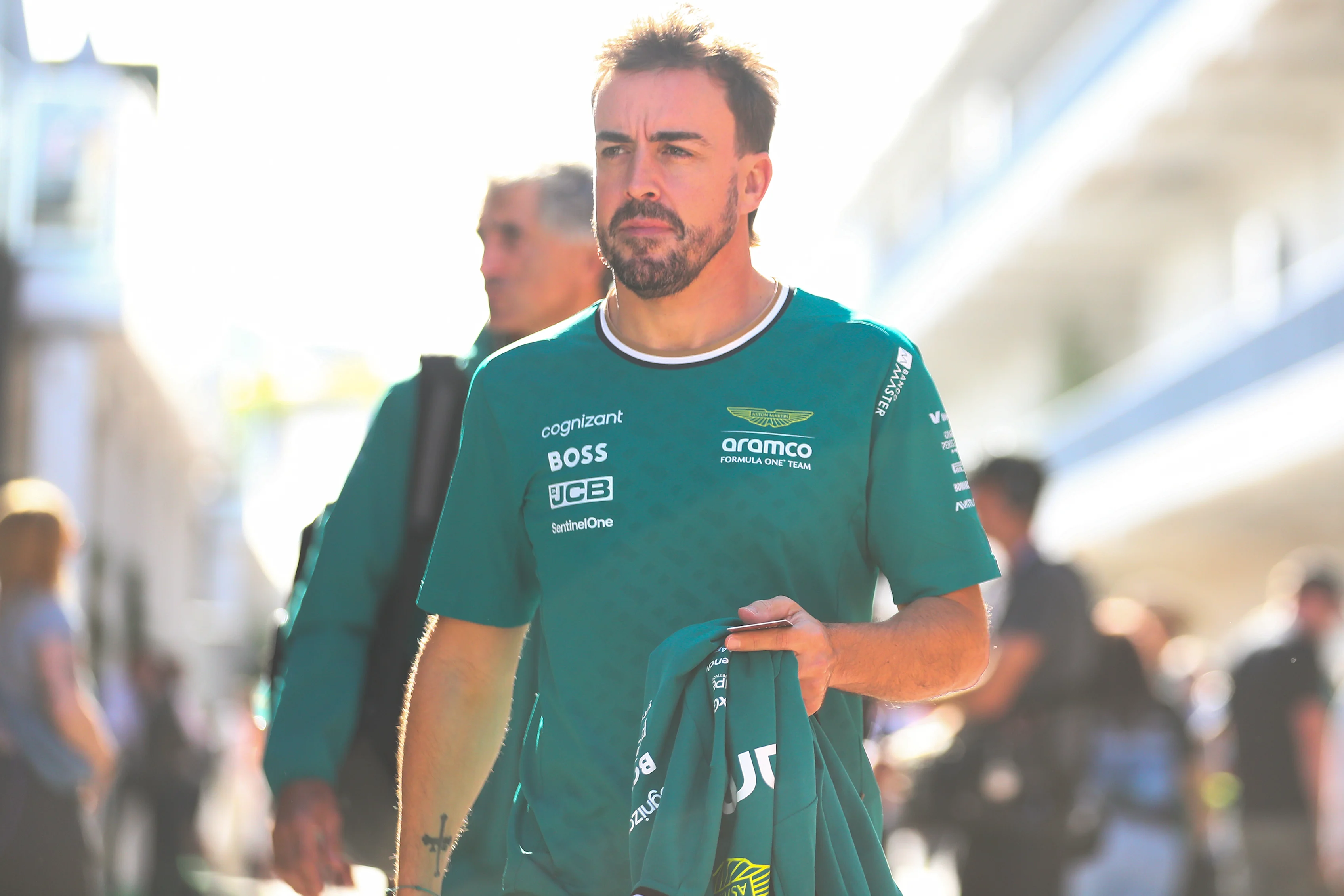 AUSTIN, TEXAS - OCTOBER 19: Fernando Alonso of Aston Martin and Spain in the paddock during the