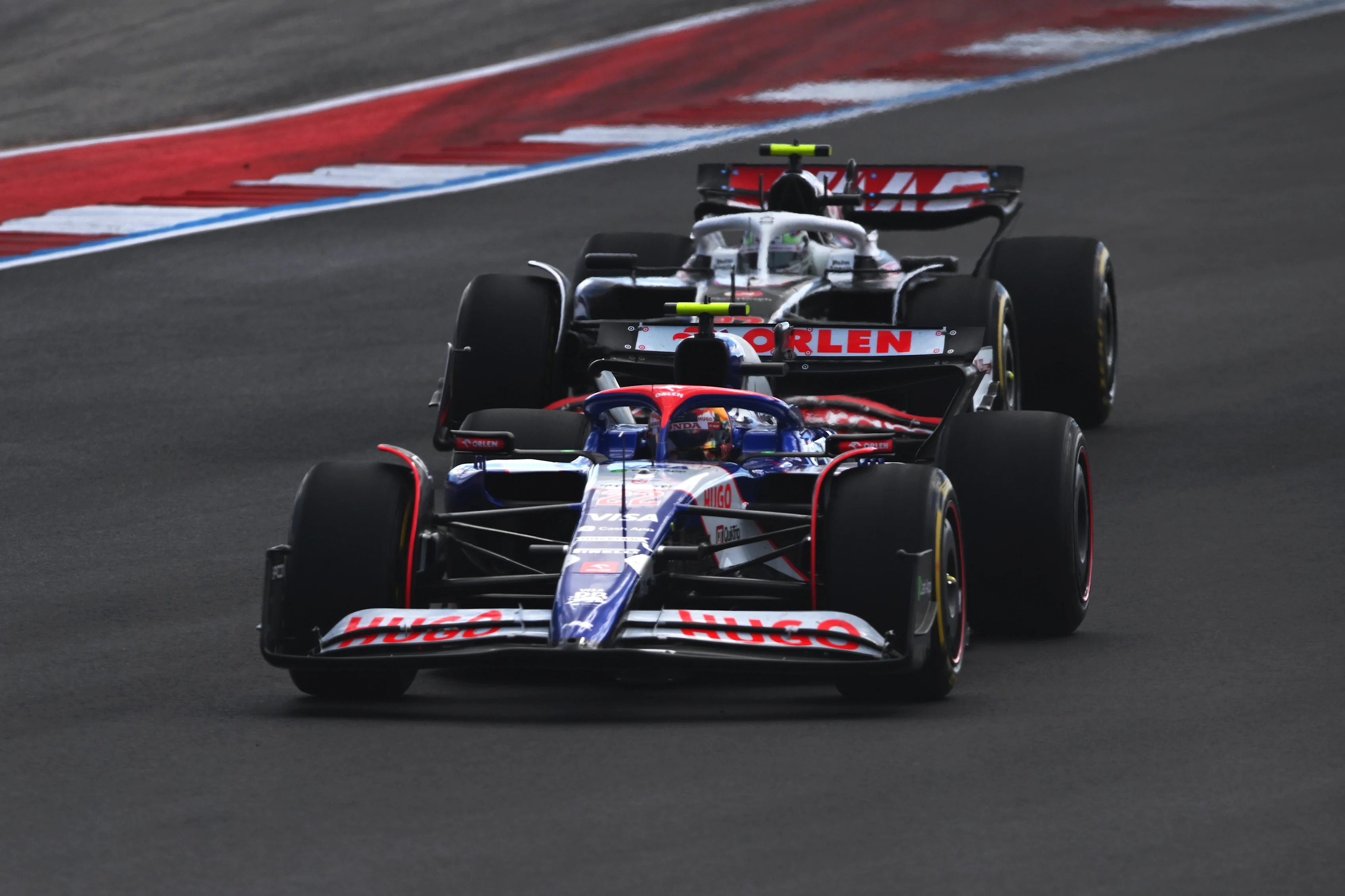AUSTIN, TEXAS - OCTOBER 19: Yuki Tsunoda of Japan driving the (22) Visa Cash App RB VCARB 01 leads Nico Hulkenberg of Germany driving the (27) Haas F1 VF-24 Ferrari during the Sprint ahead of the F1 Grand Prix of United States at Circuit of The Americas on October 19, 2024 in Austin, Texas. (Photo by Rudy Carezzevoli/Getty Images)