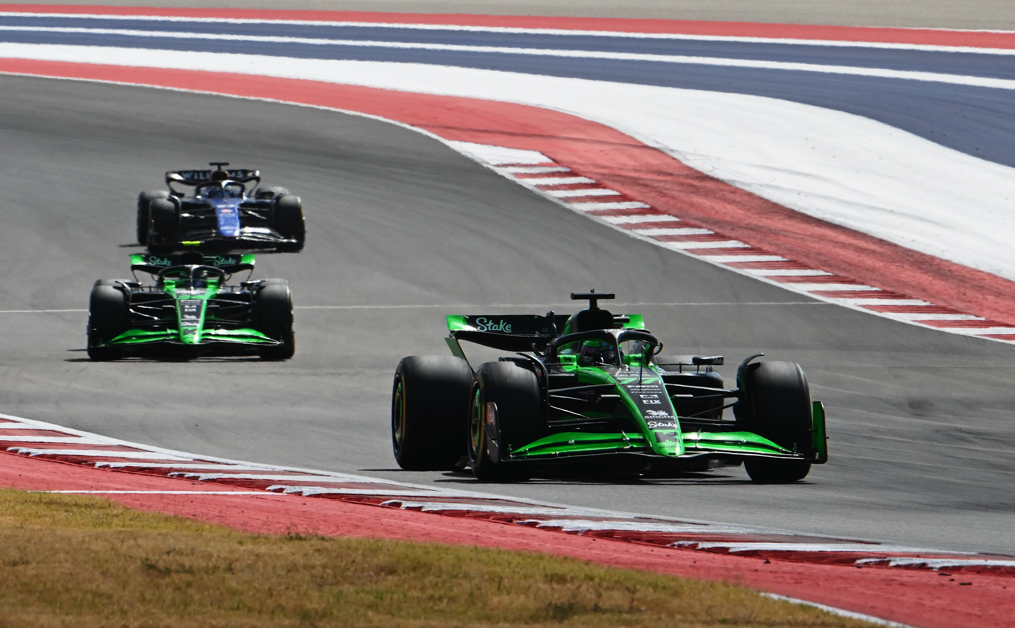 AUSTIN, TEXAS - OCTOBER 19: Valtteri Bottas of Finland driving the (77) Kick Sauber C44 Ferrari leads Zhou Guanyu of China driving the (24) Kick Sauber C44 Ferrari during the Sprint ahead of the F1 Grand Prix of United States at Circuit of The Americas on October 19, 2024 in Austin, Texas. (Photo by Mark Sutton/Getty Images)