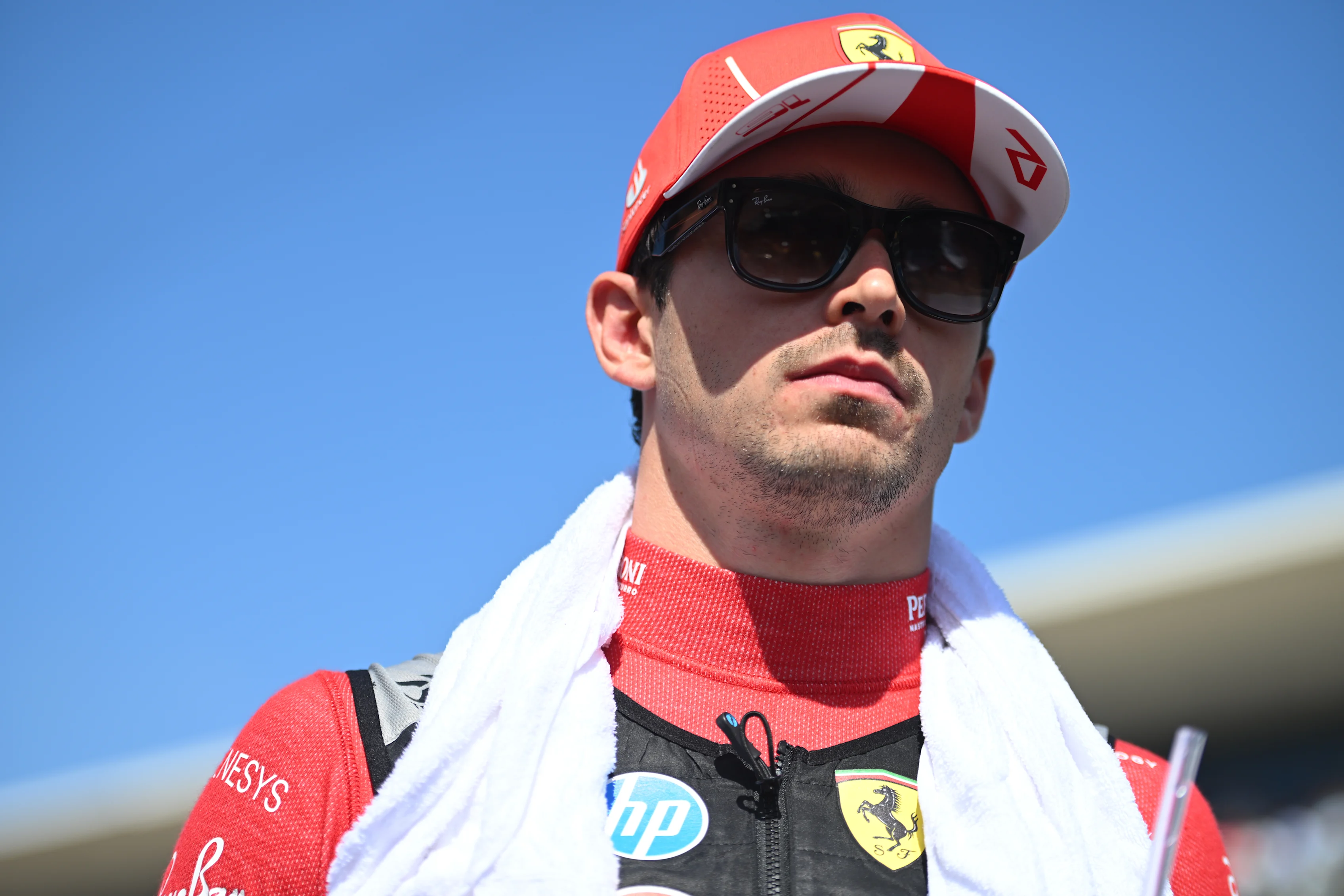 AUSTIN, TEXAS - OCTOBER 19: Charles Leclerc of Monaco and Ferrari looks on on the grid during the Sprint ahead of the F1 Grand Prix of United States at Circuit of The Americas on October 19, 2024 in Austin, Texas. (Photo by Rudy Carezzevoli/Getty Images)