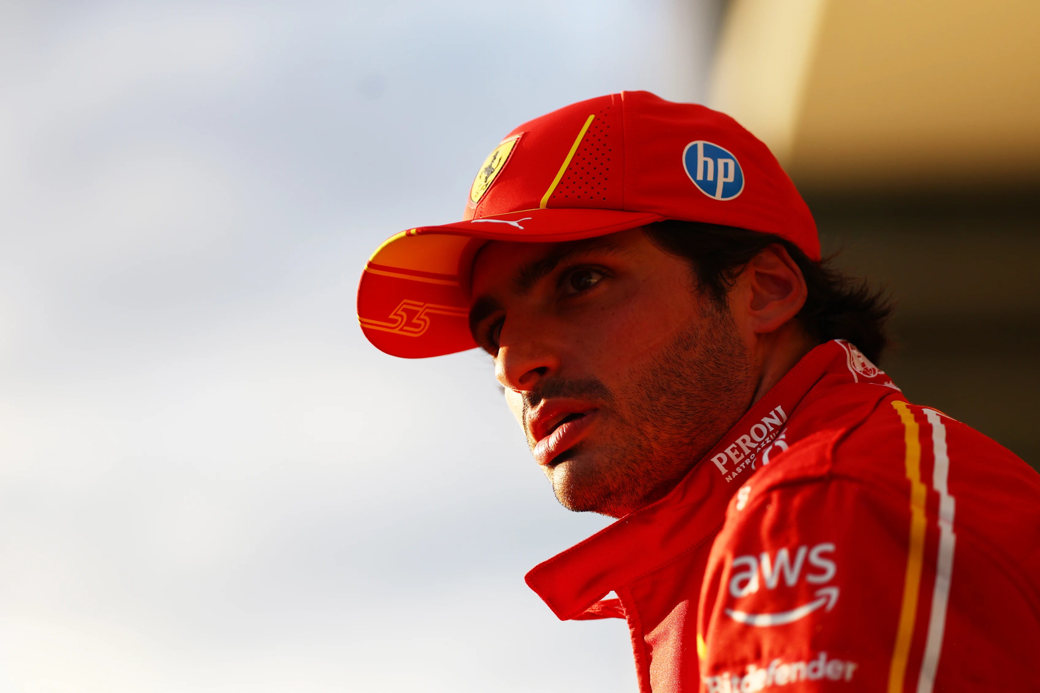 AUSTIN, TEXAS - OCTOBER 19: Third placed qualifier Carlos Sainz of Spain and Ferrari looks on in
