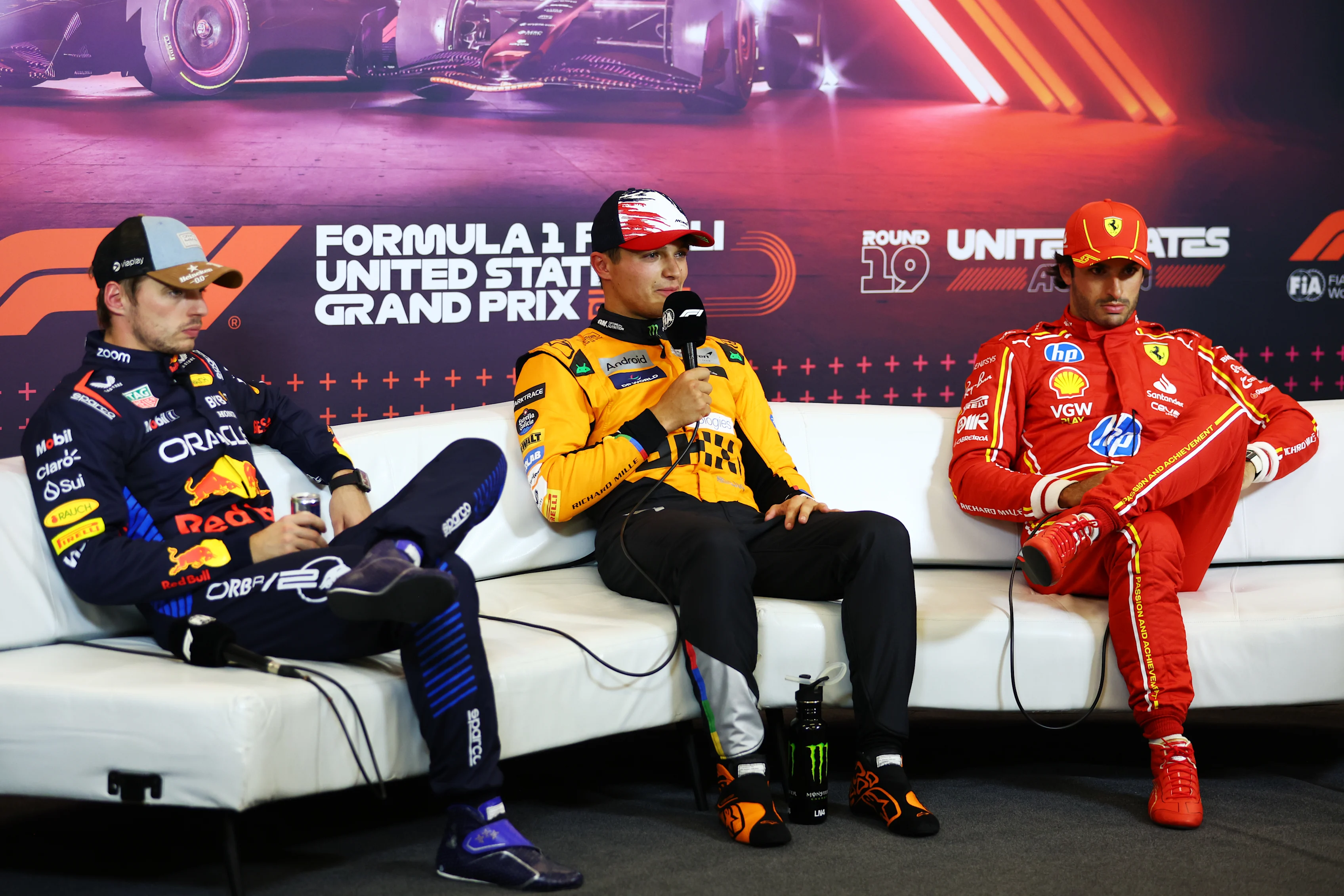 AUSTIN, TEXAS - OCTOBER 19: Pole position qualifier Lando Norris, Max Verstappen and Carlos Sainz attend the press conference after qualifying ahead of the F1 Grand Prix of United States. (Photo by Bryn Lennon - Formula 1/Formula 1 via Getty Images)
