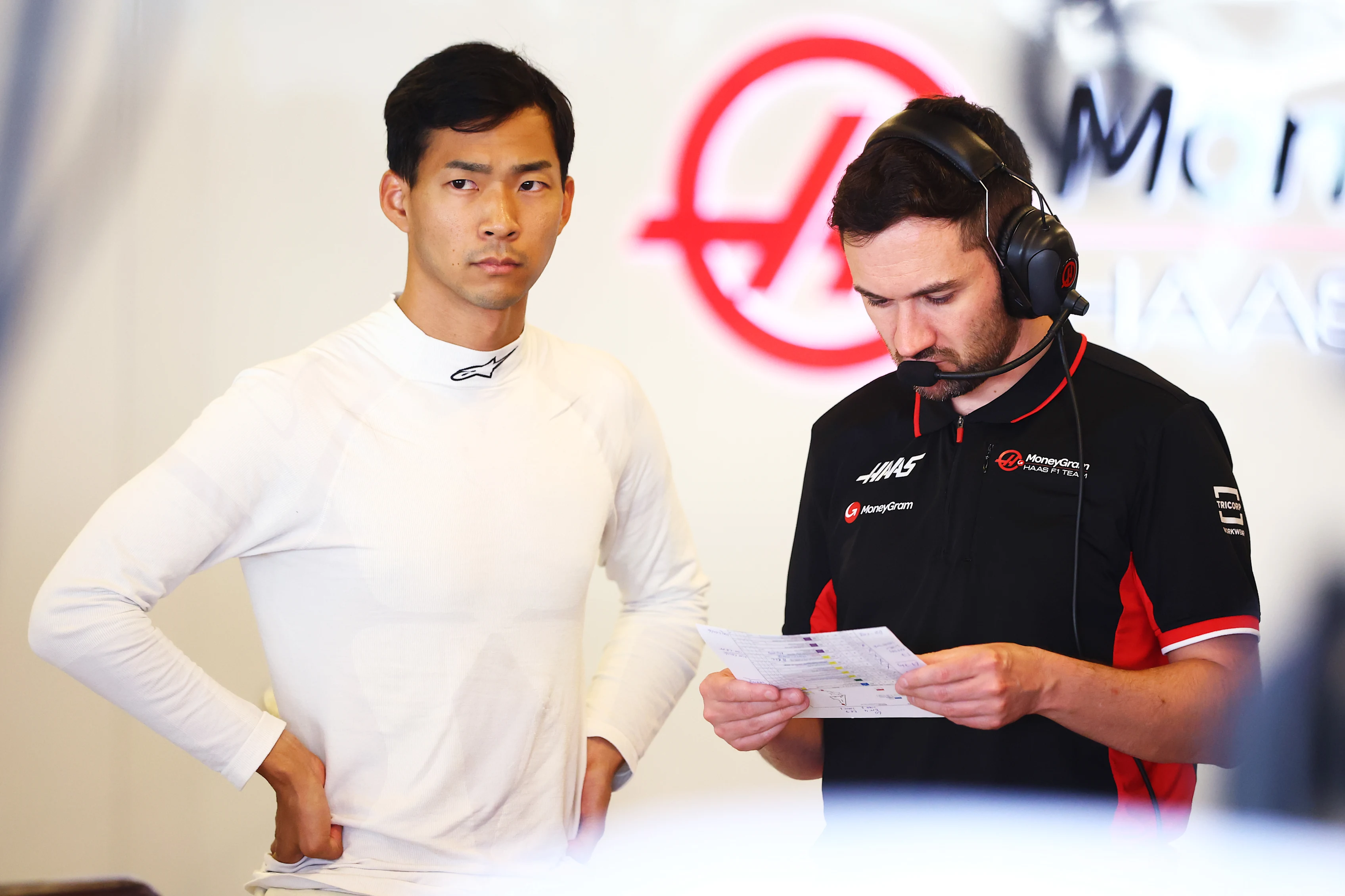ABU DHABI, UNITED ARAB EMIRATES - DECEMBER 10: Rio Hirakawa of Japan and Haas F1 looks on in the