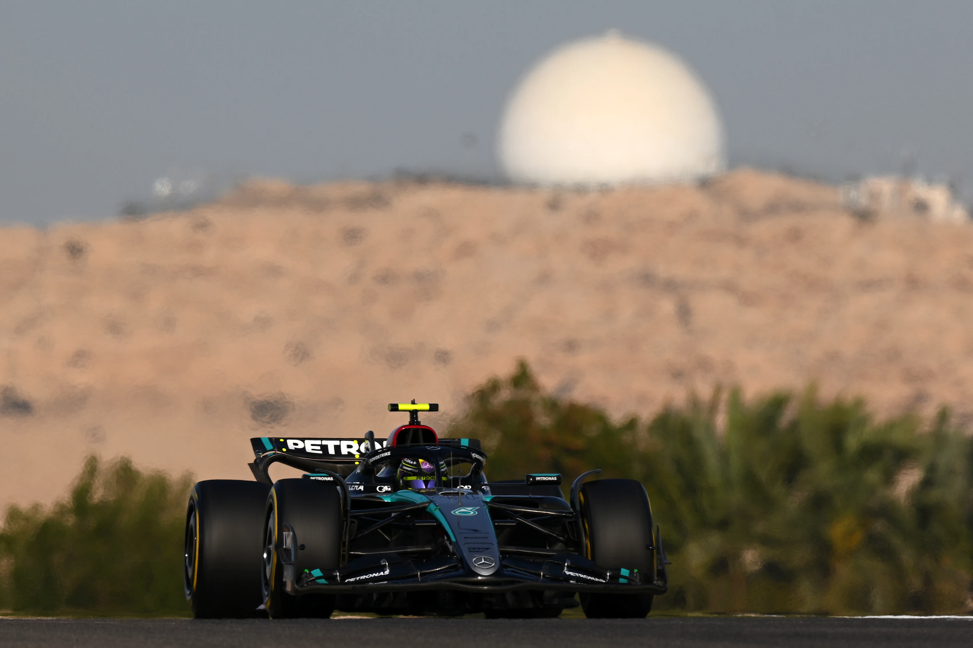BAHRAIN, BAHRAIN - FEBRUARY 22: Lewis Hamilton of Great Britain driving the (44) Mercedes AMG