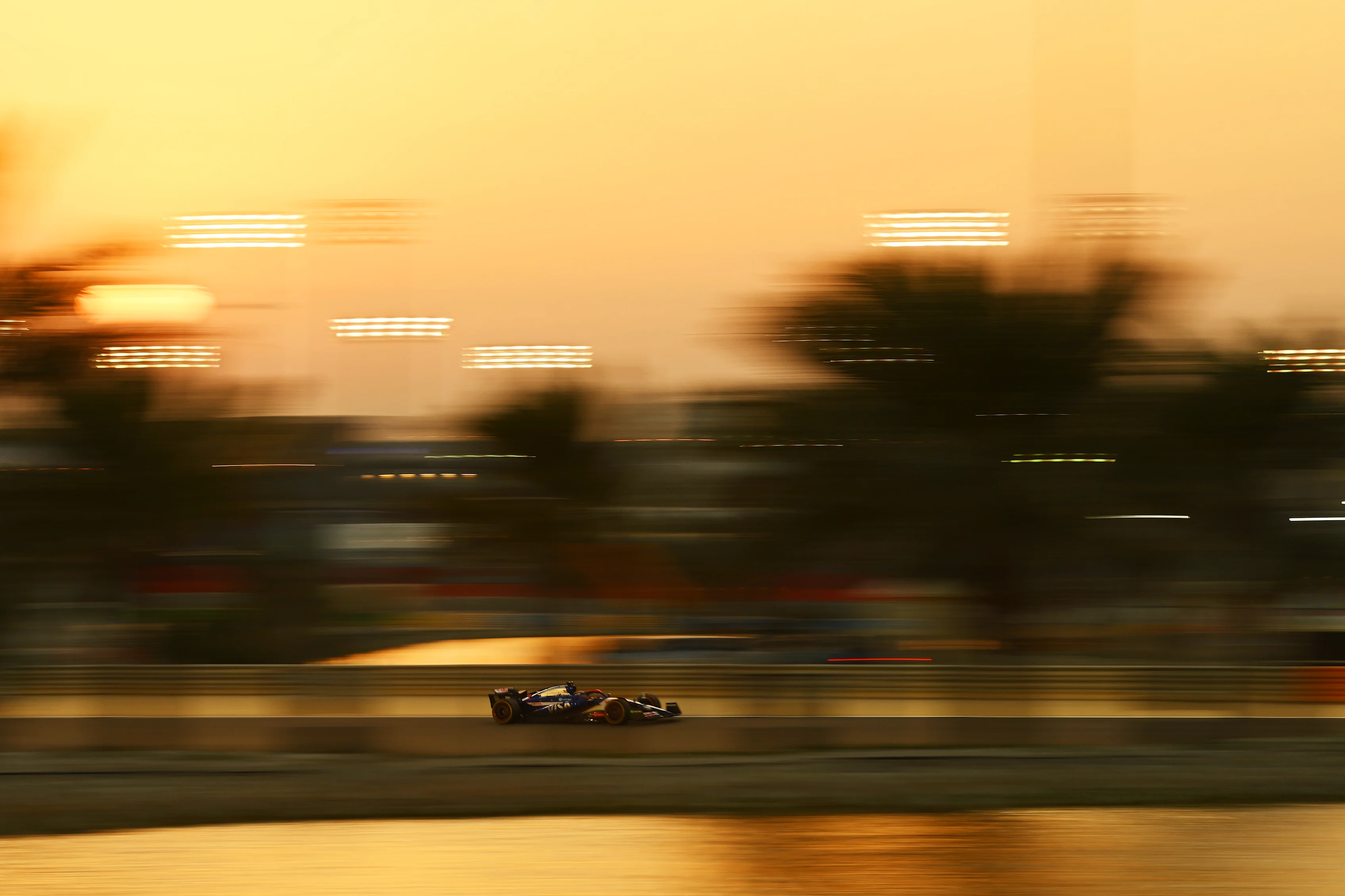 BAHRAIN, BAHRAIN - FEBRUARY 22: Daniel Ricciardo of Australia driving the (3) Visa Cash App RB