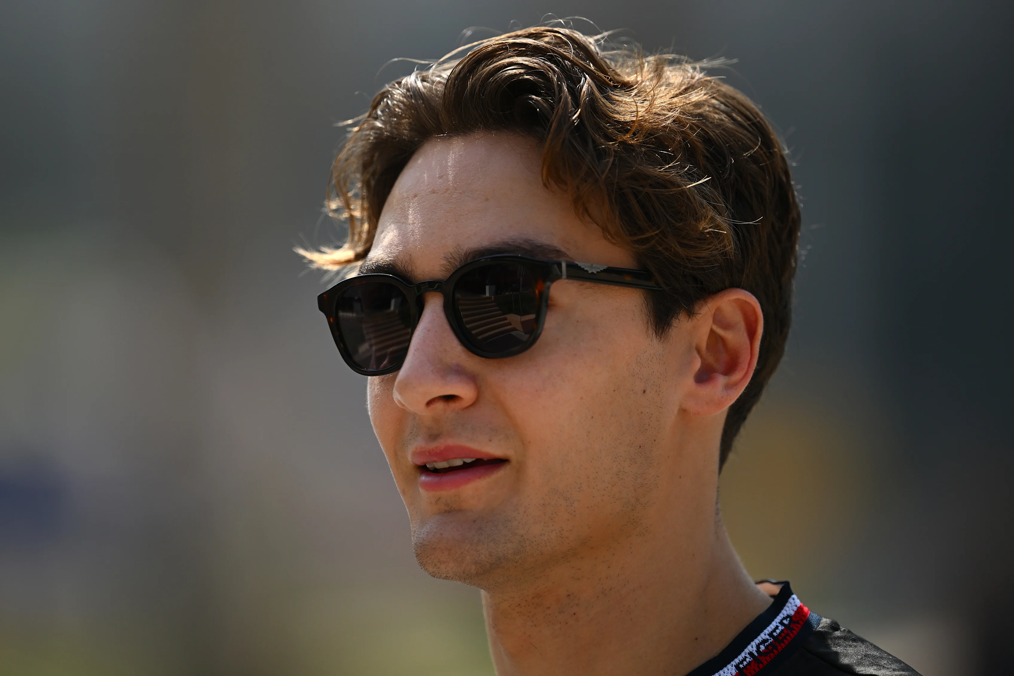 BAHRAIN, BAHRAIN - FEBRUARY 23: George Russell of Great Britain and Mercedes looks on in the