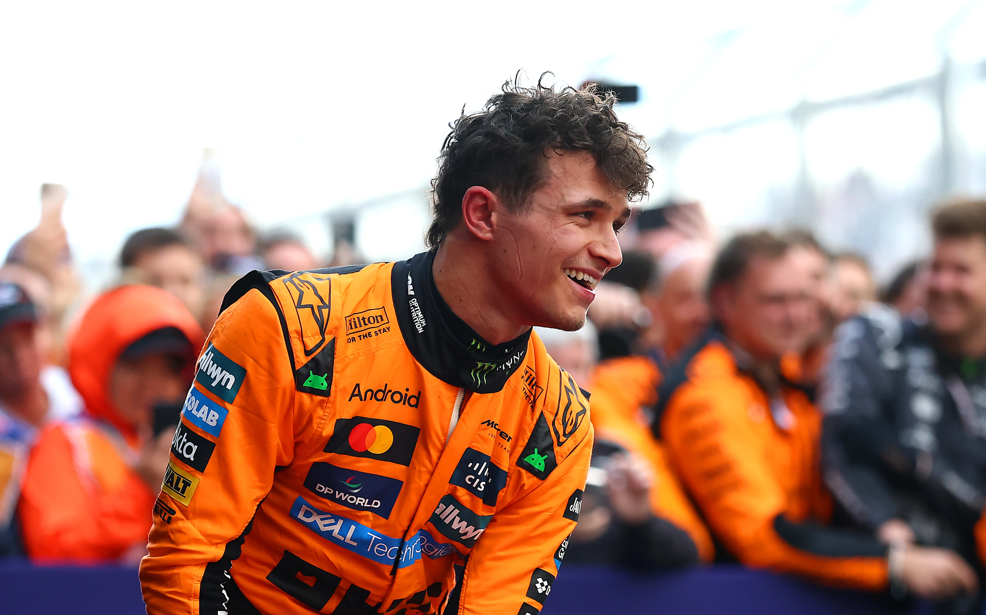 MELBOURNE, AUSTRALIA - MARCH 16: Race winner Lando Norris of Great Britain and McLaren celebrates in parc ferme during the F1 Grand Prix of Australia at Albert Park Grand Prix Circuit on March 16, 2025 in Melbourne, Australia. (Photo by Bryn Lennon - Formula 1/Formula 1 via Getty Images)