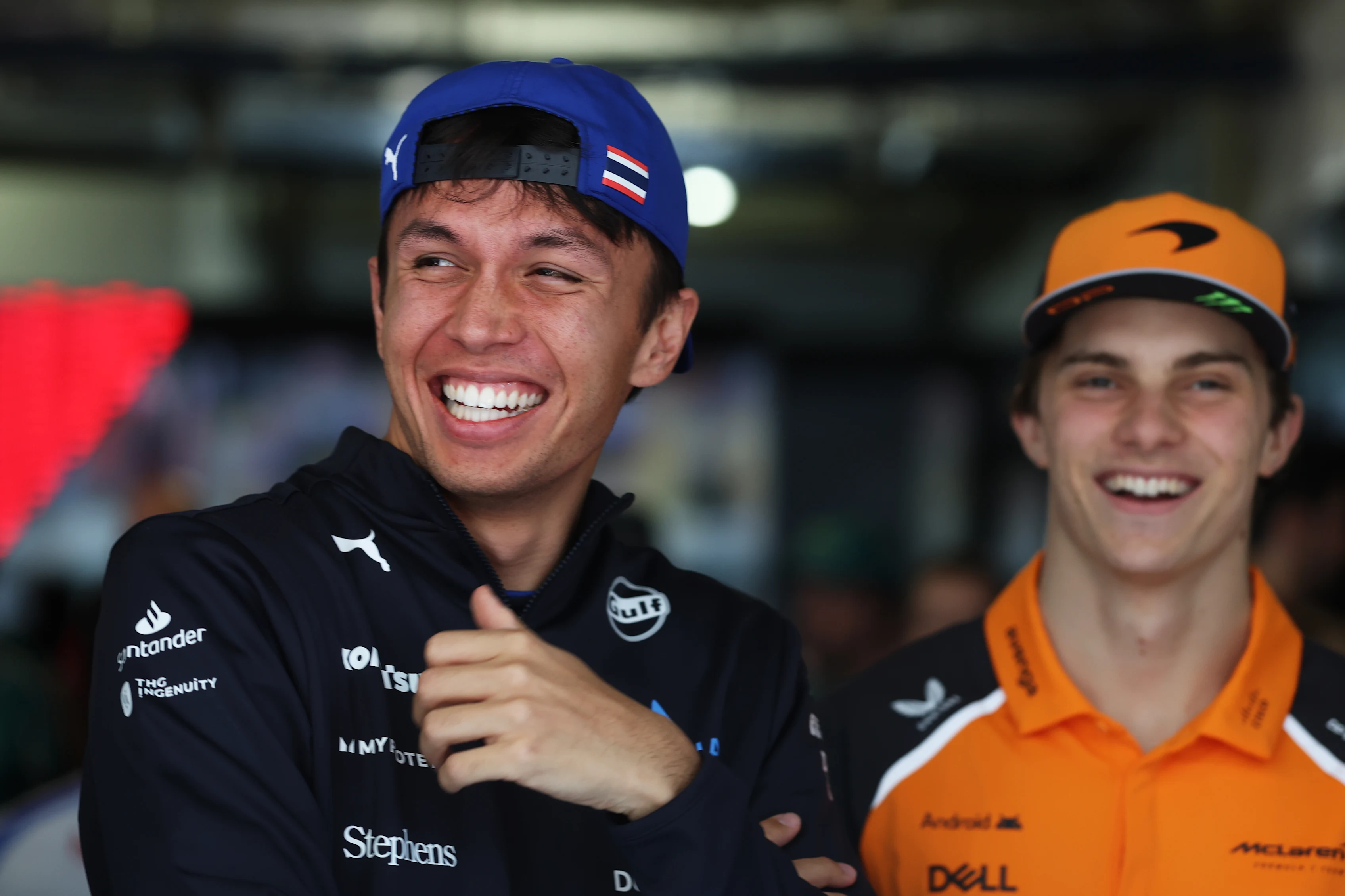 SHANGHAI, CHINA - MARCH 23: Alexander Albon of Thailand and Williams with Oscar Piastri of Australia and McLaren prior to the F1 Grand Prix of China at Shanghai International Circuit on March 23, 2025 in Shanghai, China. (Photo by Mark Thompson/Getty Images)