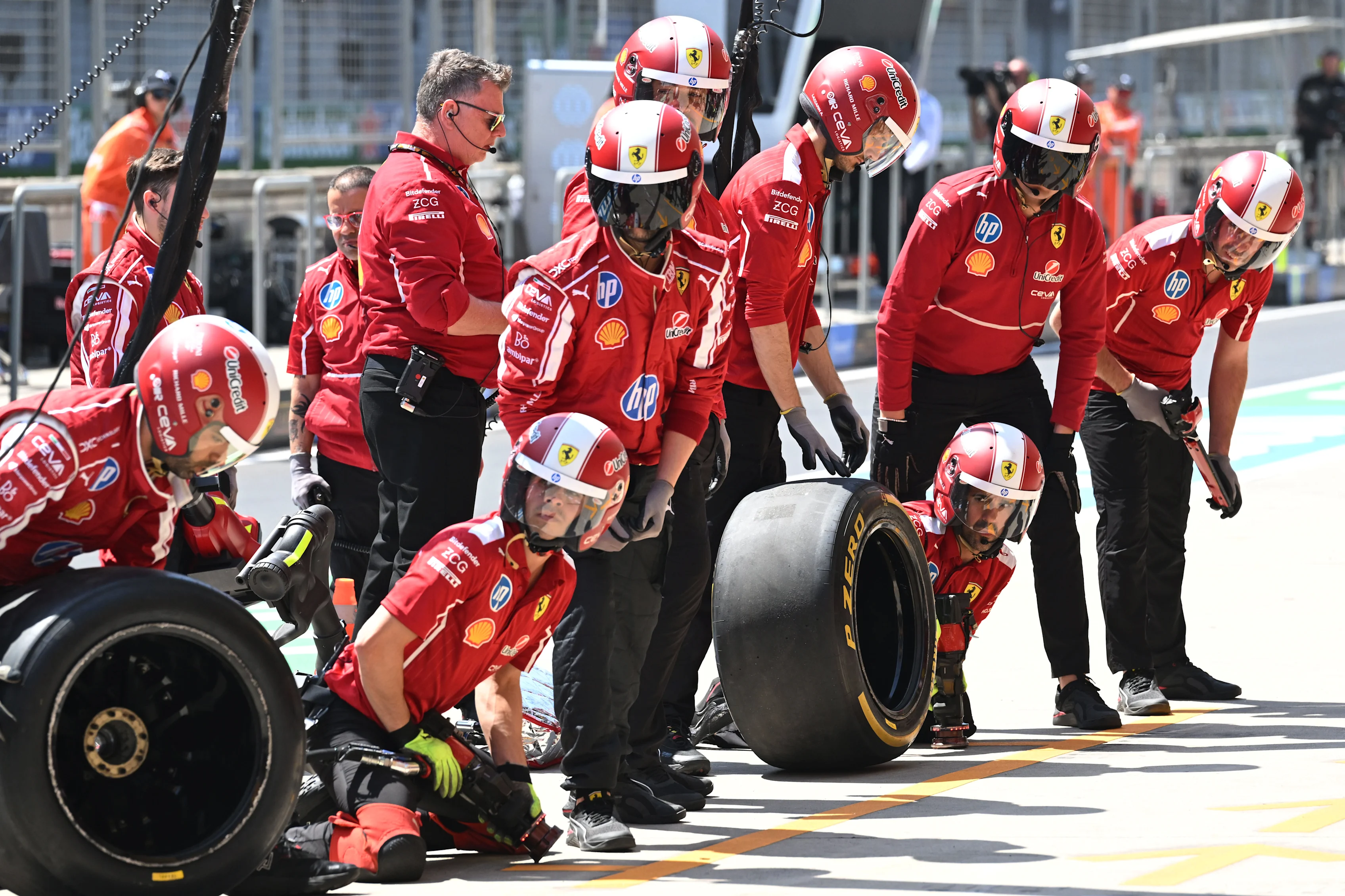 SHANGHAI, CHINA - MARCH 21: The Ferrari pit crew ready for a stop during practice ahead of the F1