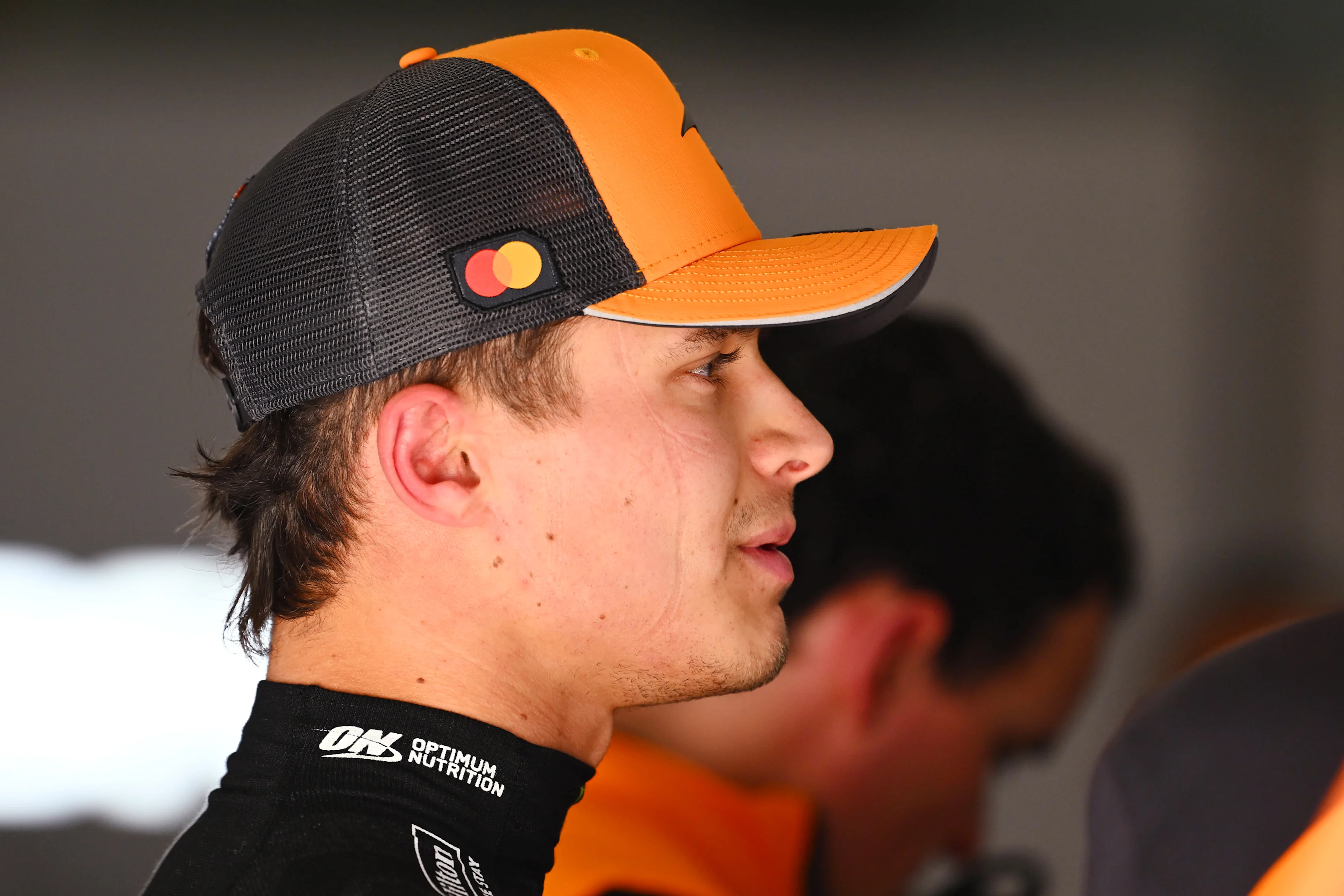 SHANGHAI, CHINA - MARCH 21: Lando Norris of Great Britain and McLaren looks on in the garage during practice ahead of the F1 Grand Prix of China at Shanghai International Circuit on March 21, 2025 in Shanghai, China. (Photo by Mark Sutton - Formula 1/Formula 1 via Getty Images)