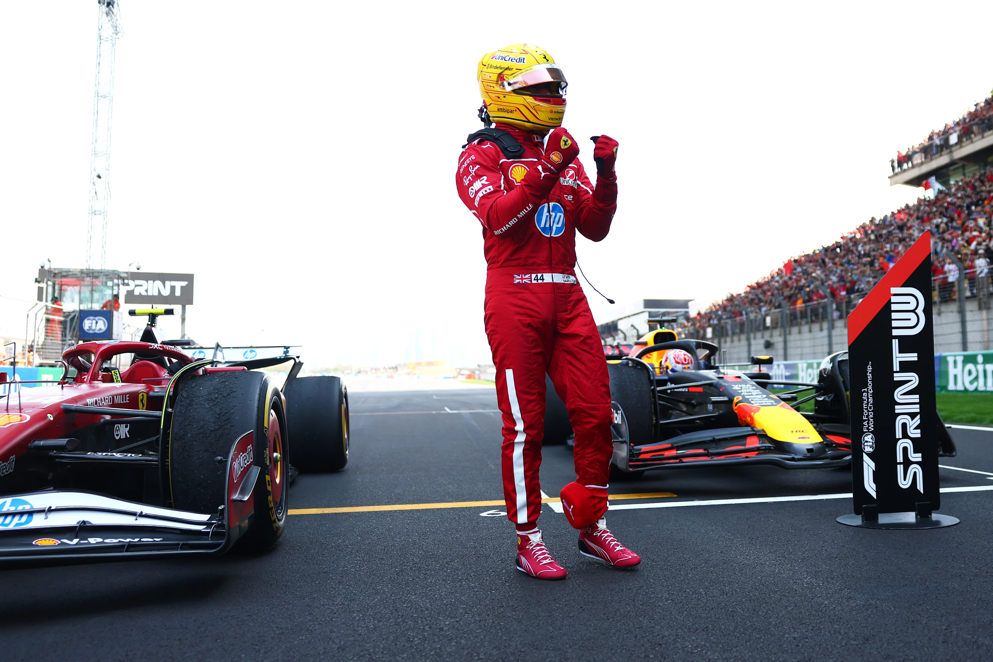 SHANGHAI, CHINA - MARCH 22: Sprint winner Lewis Hamilton of Great Britain and Scuderia Ferrari celebrates in parc ferme during the Sprint ahead of the F1 Grand Prix of China at Shanghai International Circuit on March 22, 2025 in Shanghai, China. (Photo by Bryn Lennon - Formula 1/Formula 1 via Getty Images)