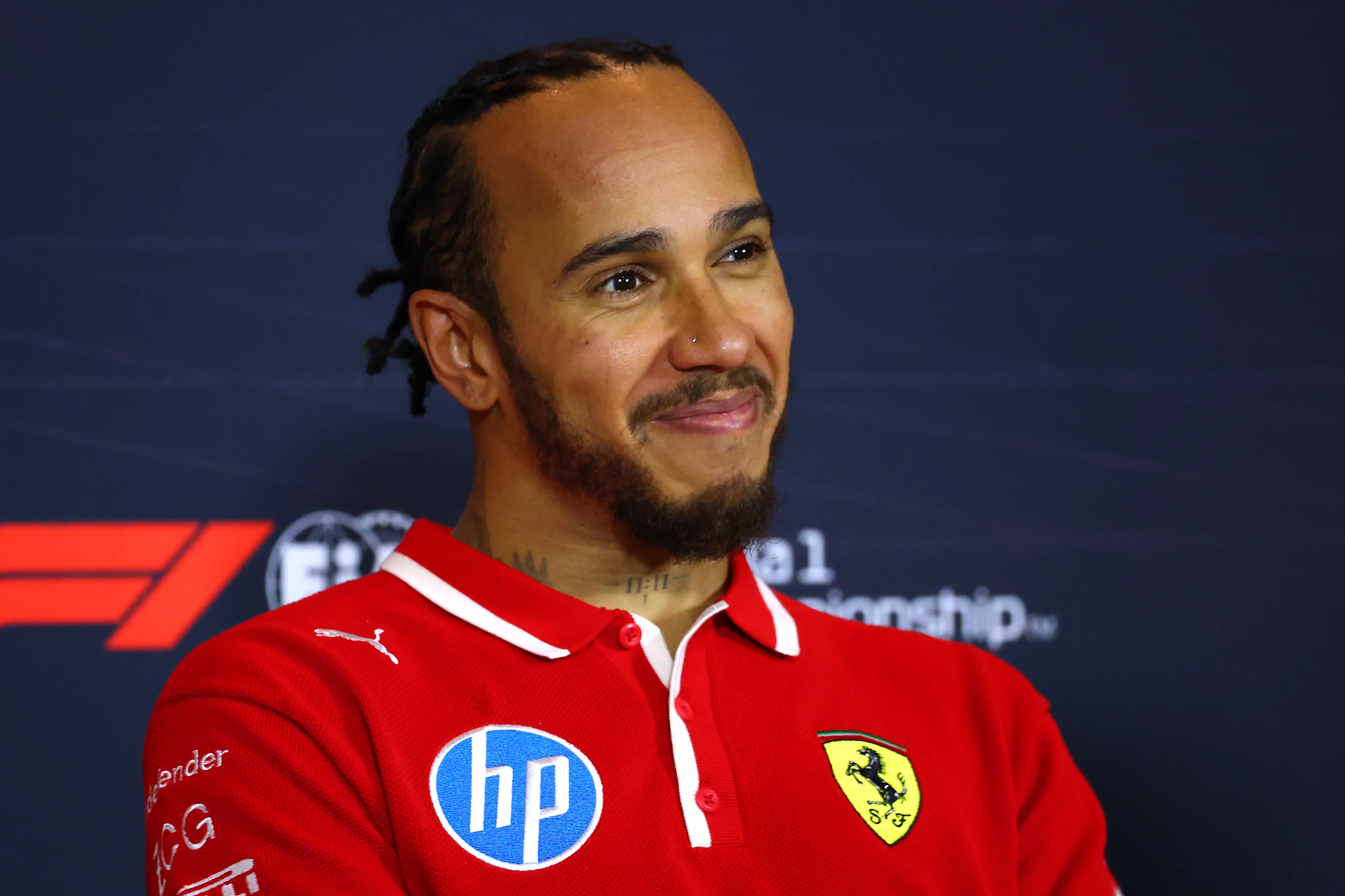 SHANGHAI, CHINA - MARCH 22: Sprint winner Lewis Hamilton of Great Britain and Scuderia Ferrari in the Drivers Press Conference during the Sprint ahead of the F1 Grand Prix of China at Shanghai International Circuit on March 22, 2025 in Shanghai, China. (Photo by Clive Rose/Getty Images)