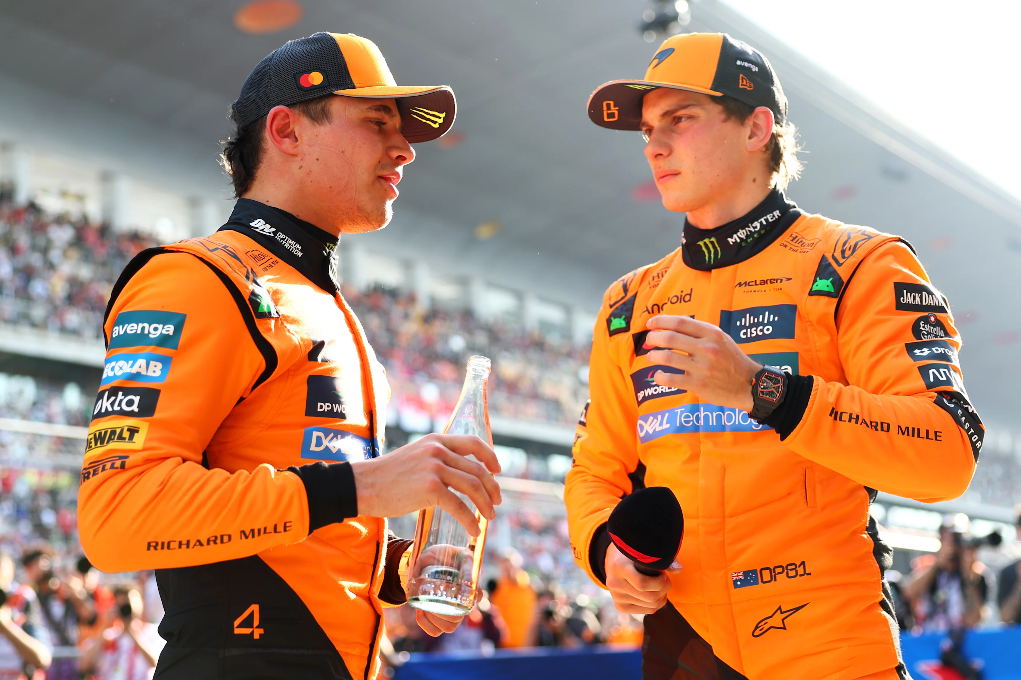 SHANGHAI, CHINA - MARCH 22: Pole position qualifier Oscar Piastri of Australia and McLaren and Third placed qualifier Lando Norris of Great Britain and McLaren talk in parc ferme during qualifying ahead of the F1 Grand Prix of China at Shanghai International Circuit on March 22, 2025 in Shanghai, China. (Photo by Bryn Lennon - Formula 1/Formula 1 via Getty Images)