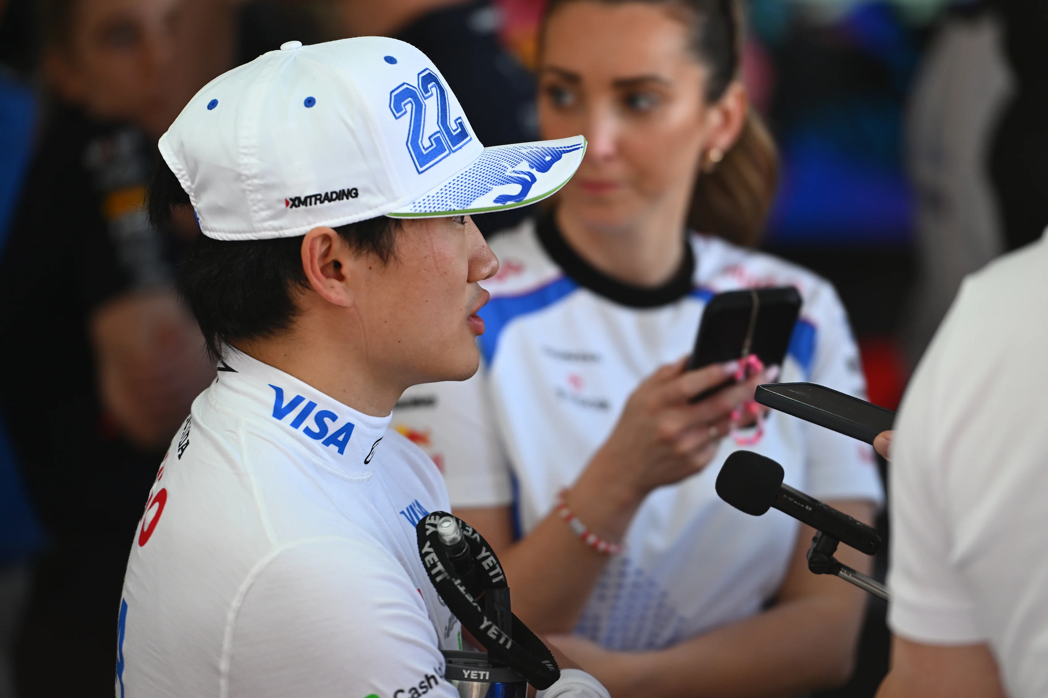 Ninth placed qualifier Yuki Tsunoda of Visa Cash App Racing Bulls is interviewed during qualifying ahead of the F1 Grand Prix of China at Shanghai International Circuit on March 22, 2025 in Shanghai, China. (Photo by Rudy Carezzevoli/Getty Images)