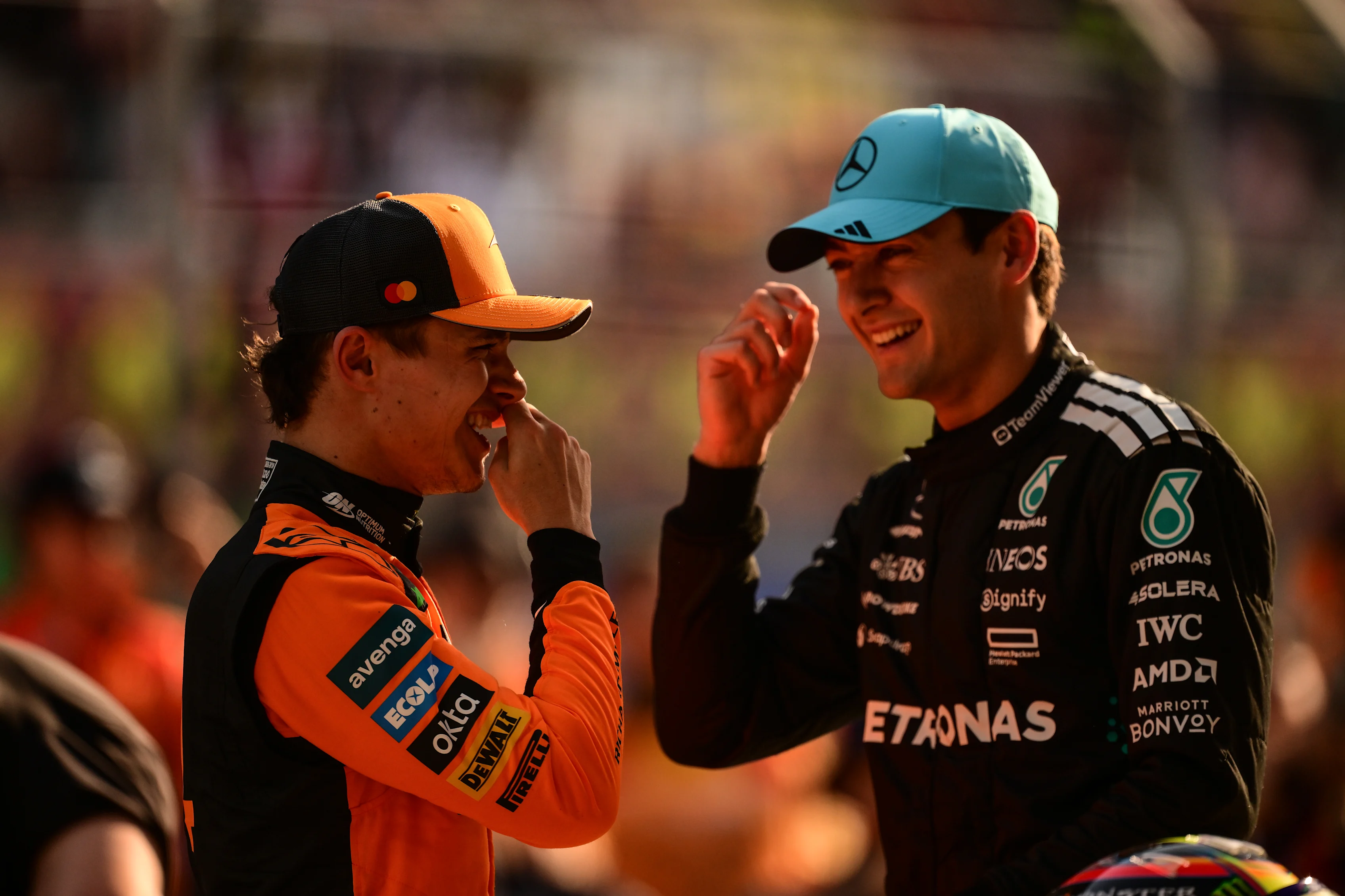 Lando Norris and George Russell talk in parc ferme during qualifying ahead of the F1 Grand Prix of China at Shanghai International Circuit on March 22, 2025 in Shanghai, China. (Photo by Mario Renzi - Formula 1/Formula 1 via Getty Images)
